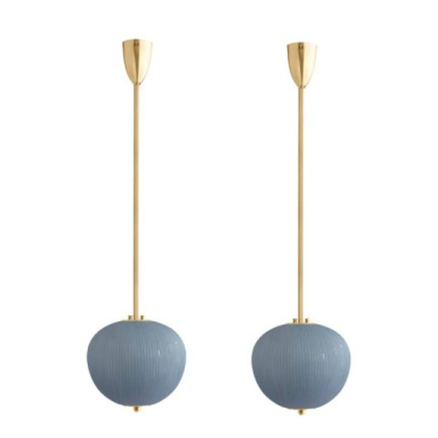 Pendant China 03 by Magic Circus Editions
Dimensions: H 90 x W 26.2 x D 26.2 cm, also available in H 110, 130, 150, 175, 190
Materials: Brass, mouth blown glass sculpted with a diamond saw
Colour: Opal grey

Available finishes: Brass,