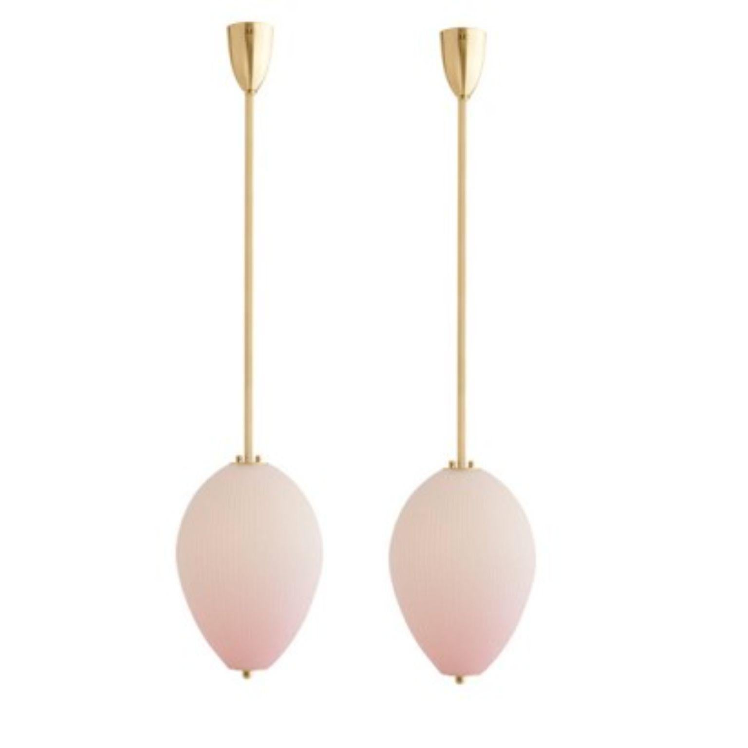 Pendant China 10 by Magic Circus Editions
Dimensions: H 90 x W 32 x D 32 cm, also available in H 110, 130, 150, 175, 190 cm
Materials: Brass, mouth blown glass sculpted with a diamond saw
Colour: Soft rose

Available finishes: Brass,