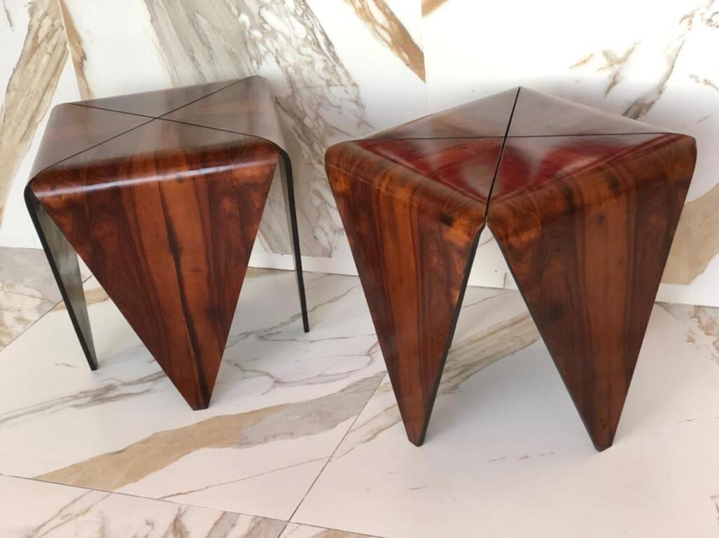 Designed by Jorge Zalszupin. 
Manufactured by his own company L’Atelier San Paolo in 1959. 

Two Petala Side Tables. The tables are formed by four separate petals of Brazilian Jacaranda Rosewood and they are held together by a black metal