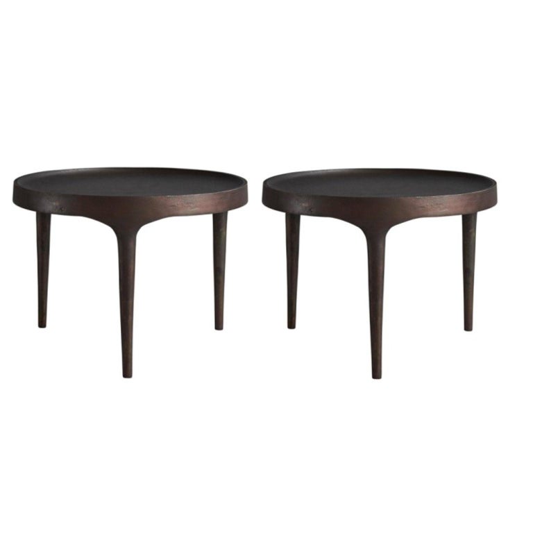 Set of 2 Phantom tables low by 101 Copenhagen
Designed by Kristian Sofus Hansen & Tommy Hyldahl
Dimensions: L 50 / W 50 /H 35 CM
Materials: Cast iron

Characterized by its intentional naive and handmade expression and raw, unpolished surface,