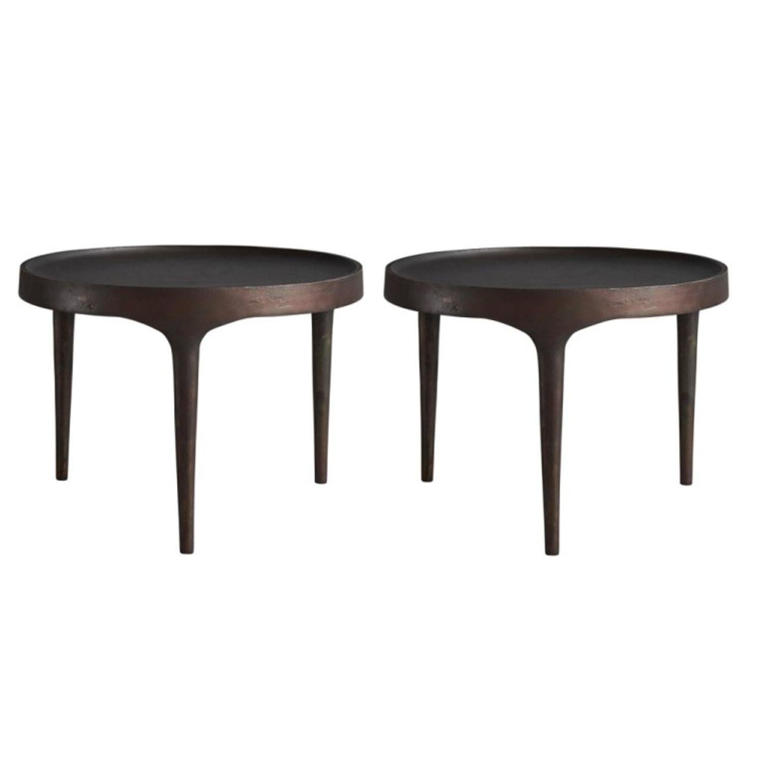 Set of 2 Phantom tables low by 101 Copenhagen
Designed by Kristian Sofus Hansen & Tommy Hyldahl
Dimensions: L 50 / W 50 /H 35 CM
Materials: Cast iron

Characterized by its intentional naive and handmade expression and raw, unpolished surface, the