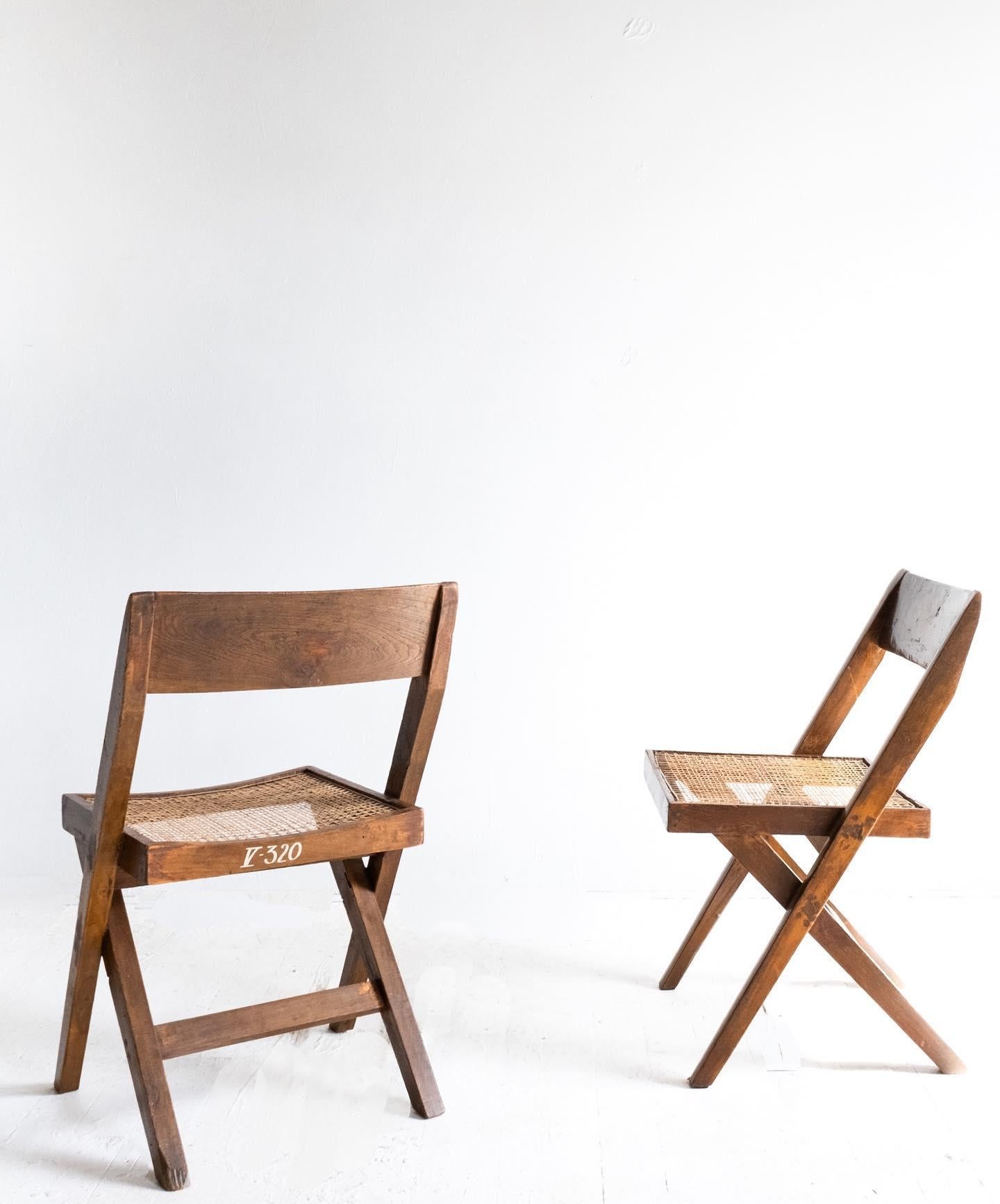 Set of two Library chairs by Pierre Jeanneret, originally designed in 1955 for University of Punjab Library in Chandigarh but later used in a variety of buildings in the new capital city. 

Currently I have these two chairs in stock but can