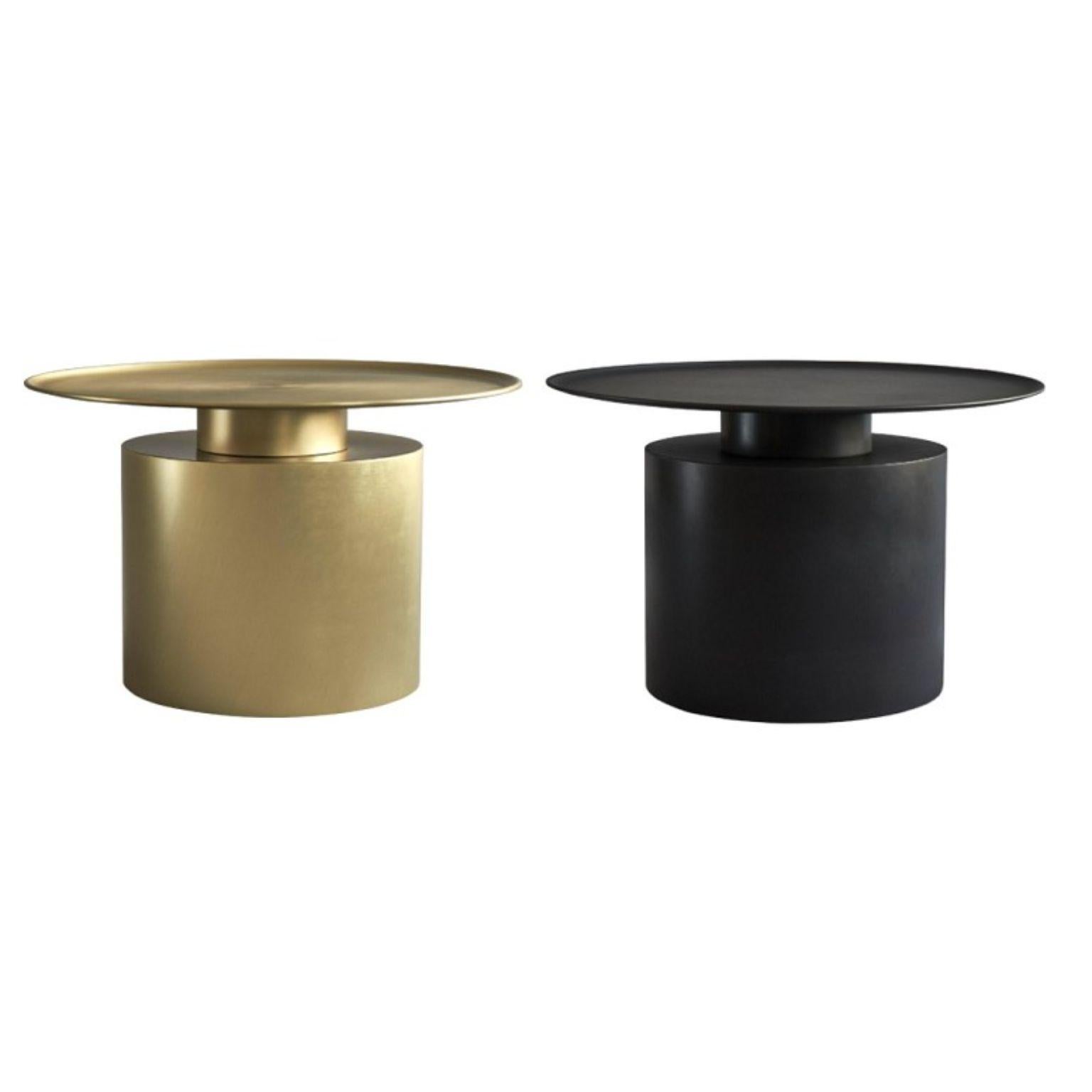 Set of 2 pillar tables Low by 101 Copenhagen
Designed by Kristian Sofus Hansen & Tommy Hyldahl
Dimensions: L 65 / W 65 /H 41 cm
Materials: Plated metal

Pillar is inspired by the rich lustrous use of material in the 1930´s Art Deco movement. The