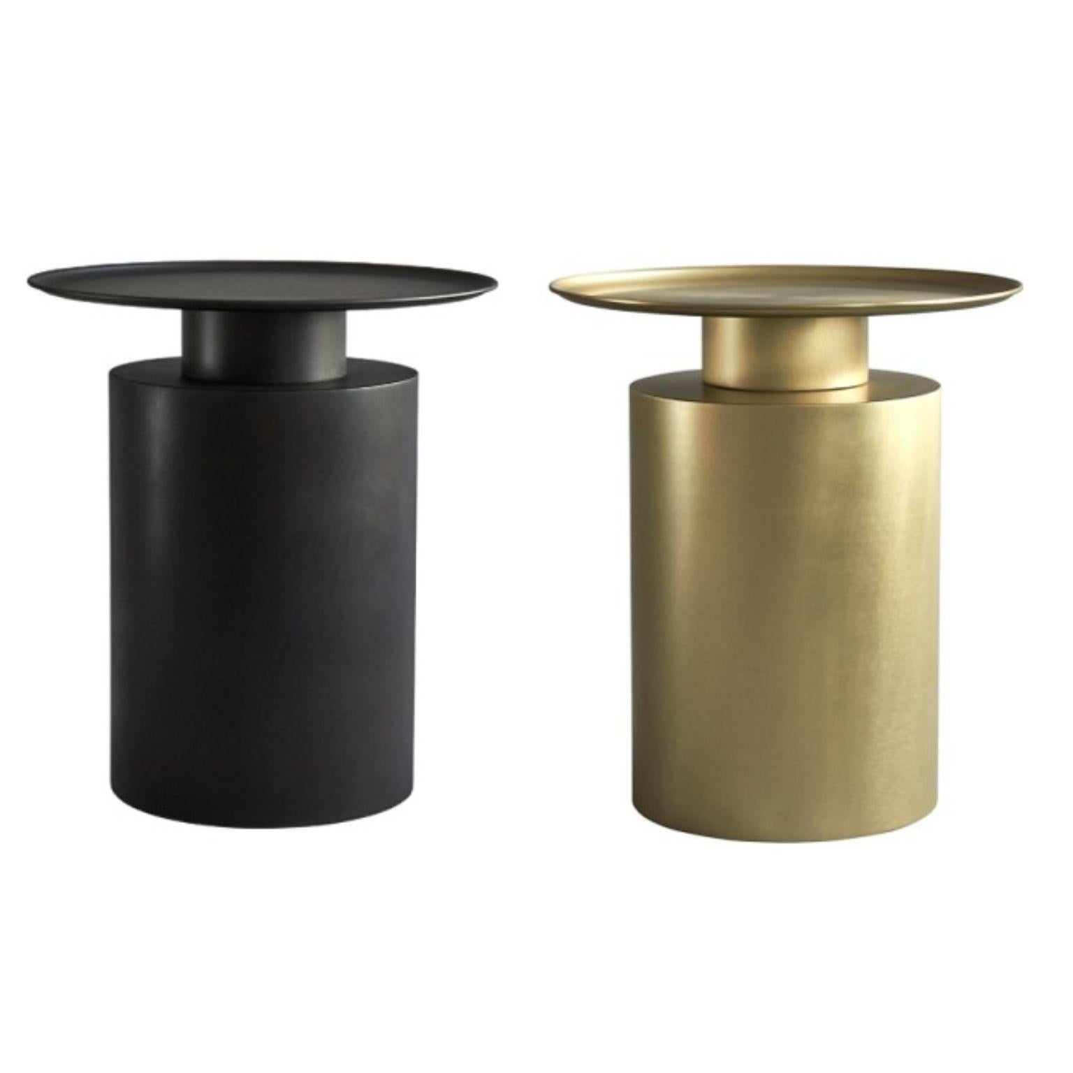 Set of 2 Pillar tables tall by 101 Copenhagen
Designed by Kristian Sofus Hansen & Tommy Hyldahl
Dimensions: L 45 / W 45 /H 50 CM
Materials: Plated Metal

Pillar is inspired by the rich lustrous use of material in the 1930´s Art Deco movement. The