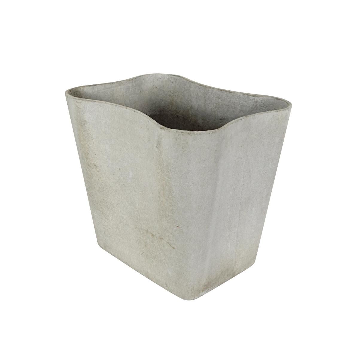 Set of two beautifully shaped planters made by Eternit. They are designed by Alfredo Häberli and Christophe Marchand. The brief called for three flowerpot designs of different capacities. The material was given: it was necessary to seek a form that
