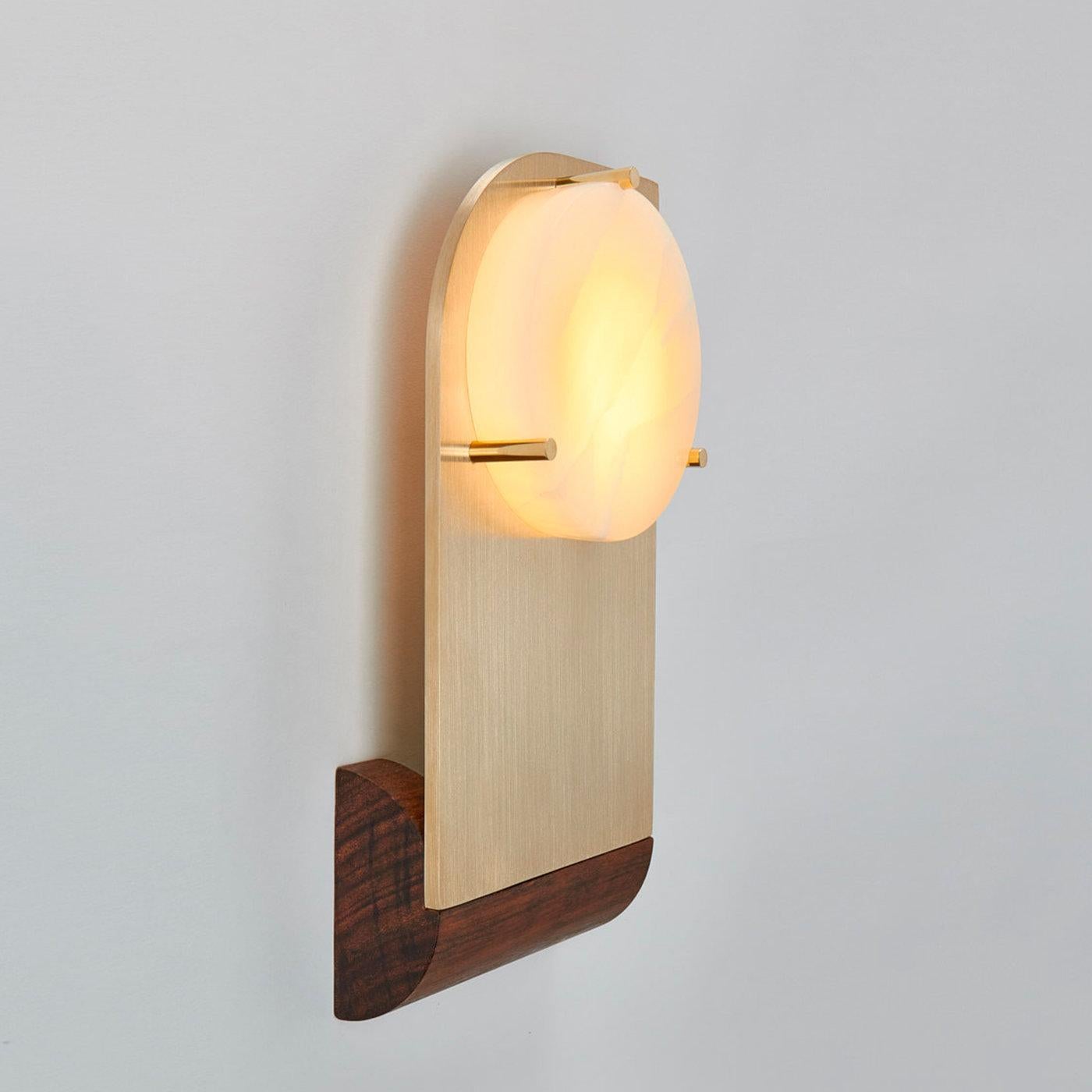 This set of 2 Polifemo sconces is suitable for illuminating and creating soft light spots on the sides of a mirror or situation that requires a symmetrical lighting composition. The name of the piece refers to the Cyclope because of the giant eye