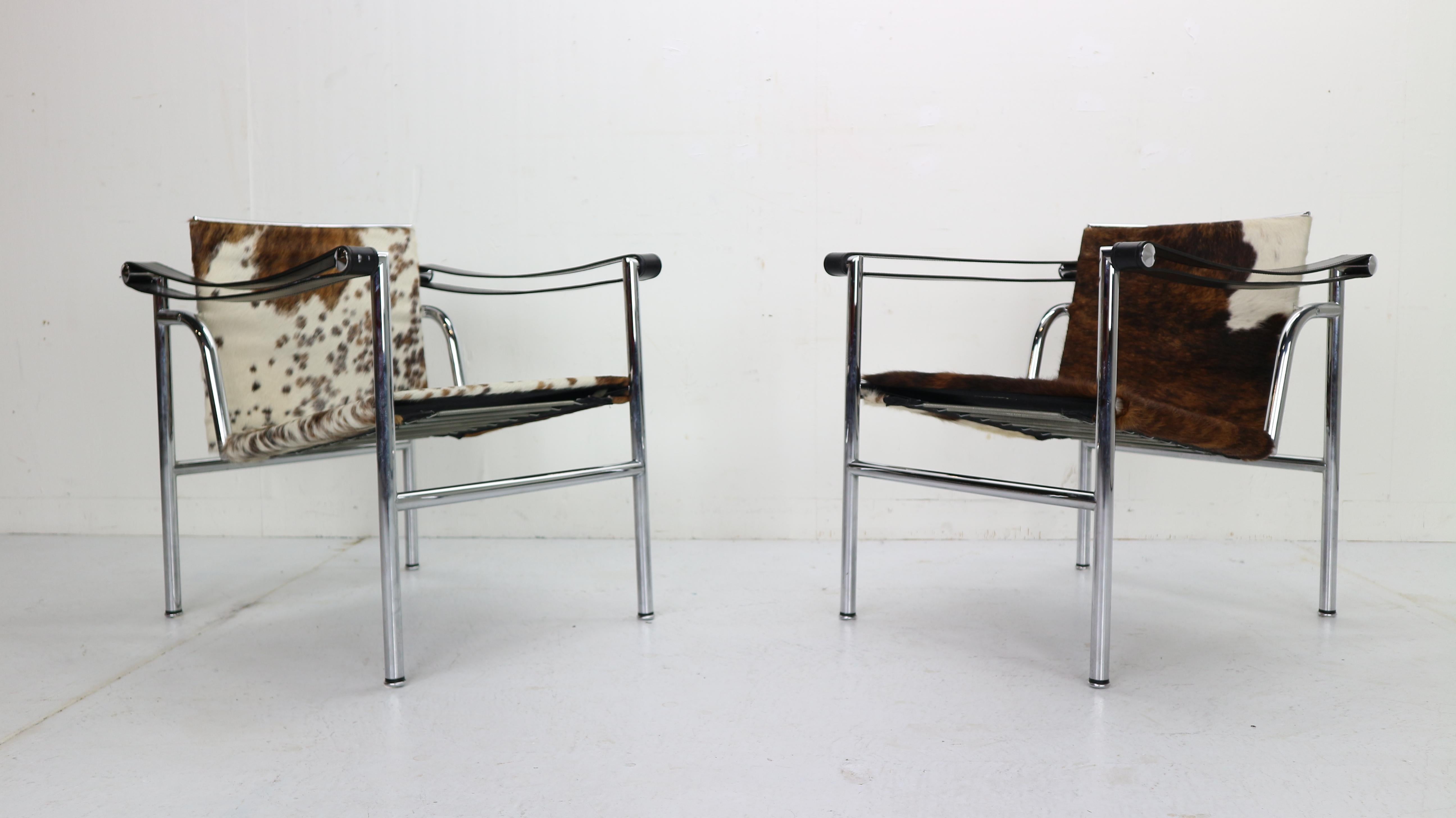 Beautiful set of 2 armchairs designed by Le Corbusier, Pierre Jeanneret and Charlotte Perriand and manufactured for Cassina, famous Italian furniture manufacture in 1970s period.
Both chairs are original signed. Model number LC1.
Chrome tubular