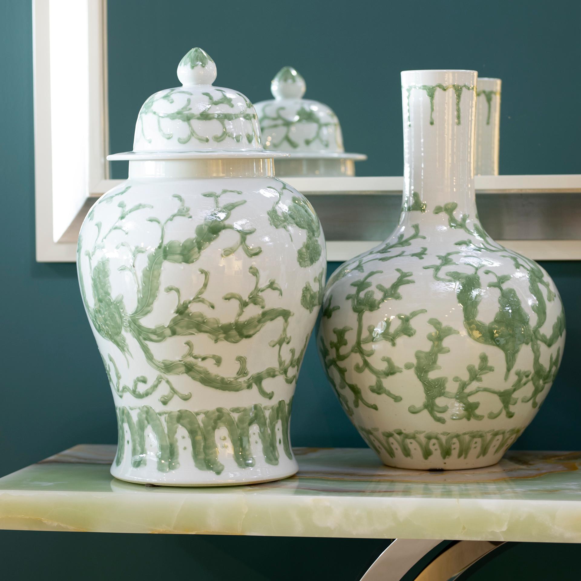Set/2 Shu Porcelain Pots, Lusitanus Home Collection by Legend of Asia.

Real chinese porcelain waterproof pots with lids in white and green, produced by hand with traditional methods. The longtime relationship between Portugal and Macau is