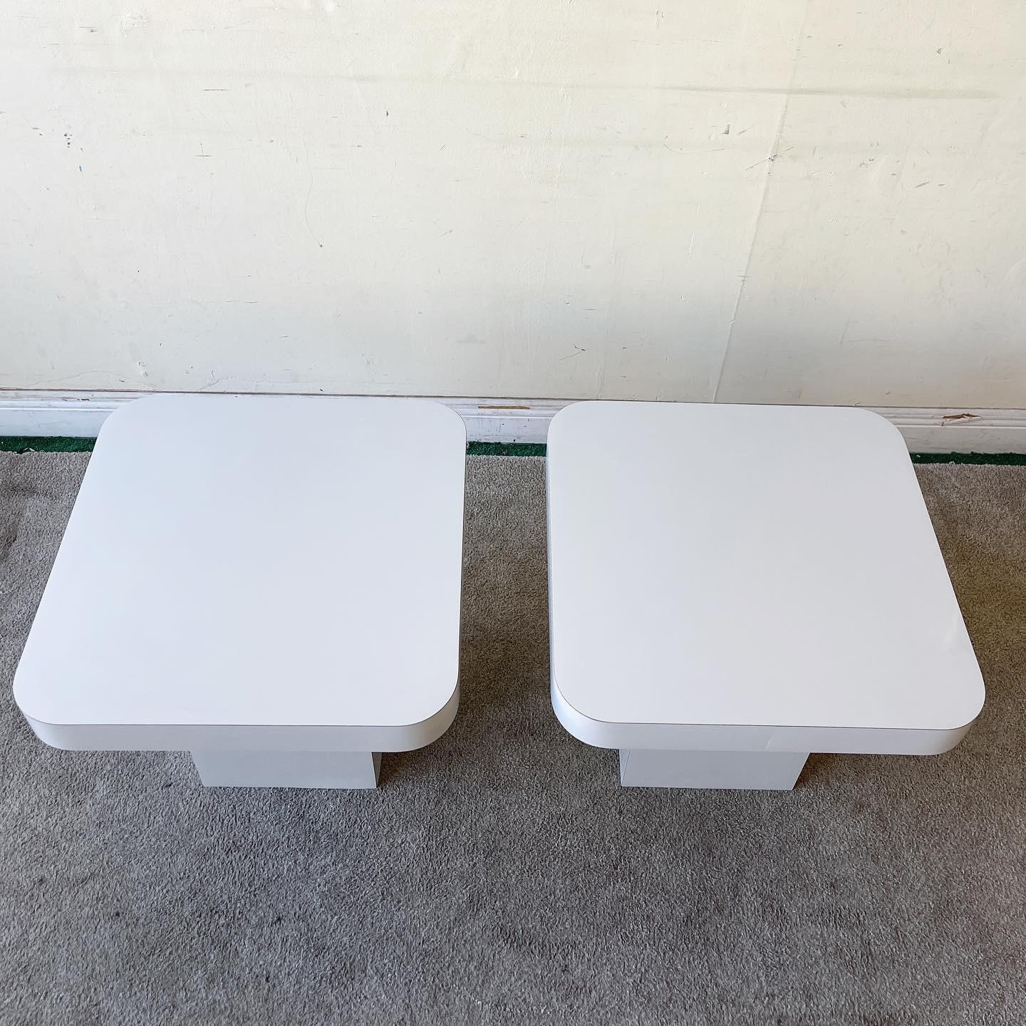 Amazing pair of postmodern mushroom side tables. Each feature a light gray lacquer laminate.

Additional information: 
Material: Laminate, Wood
Color: Gray
Style: Postmodern
Time Period: 1980s
Place of origin: USA
Dimension: 23