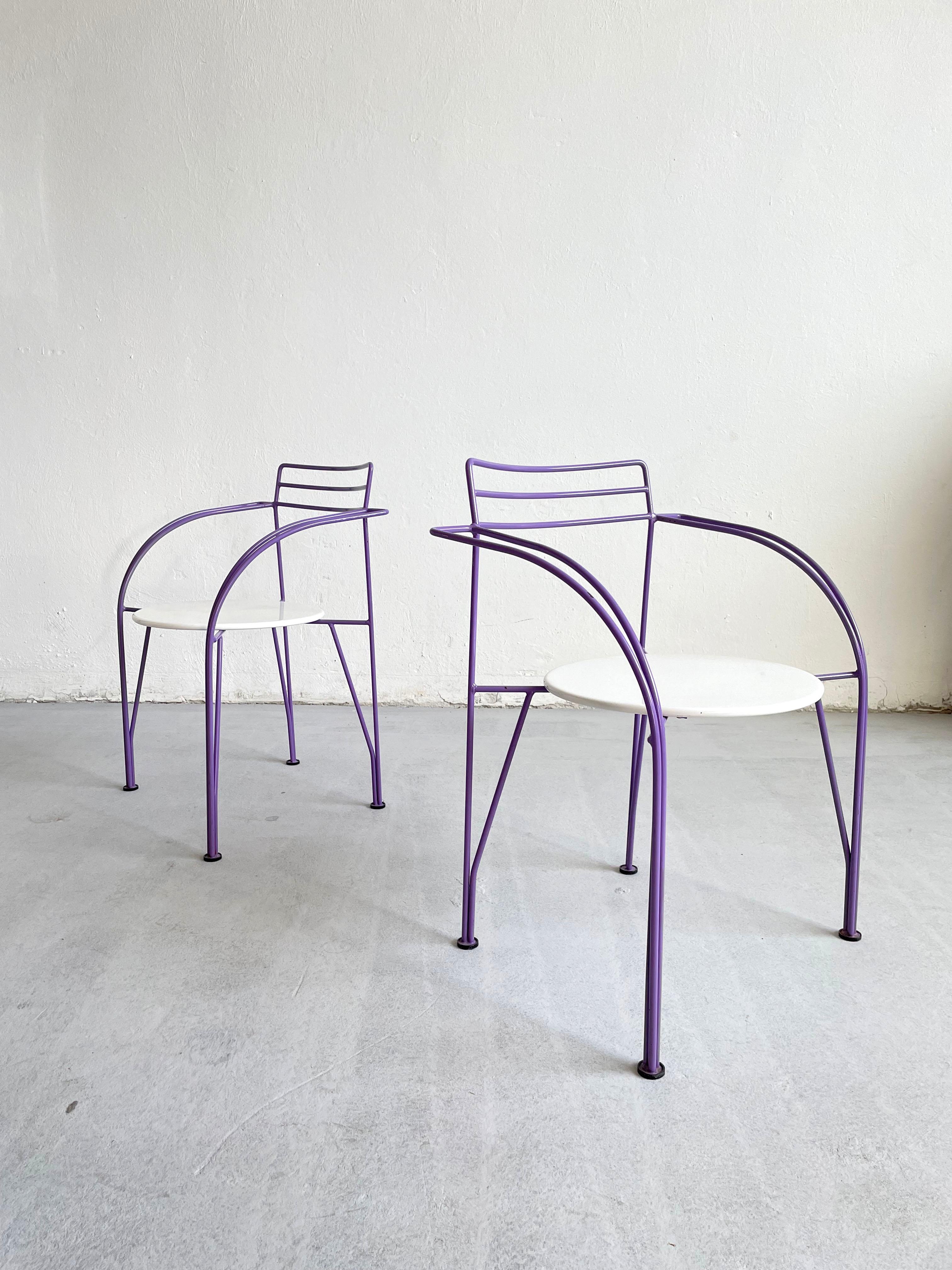 Set of 2 vintage postmodern chairs 'Lune d'Argent' (Silver Moon) by the French designer Pascal Mourgue

The sturdy minimalist steel structure of the chairs is powder-coated in white and lilac colors. 

The chair 'Lune d'Argent' was designed in