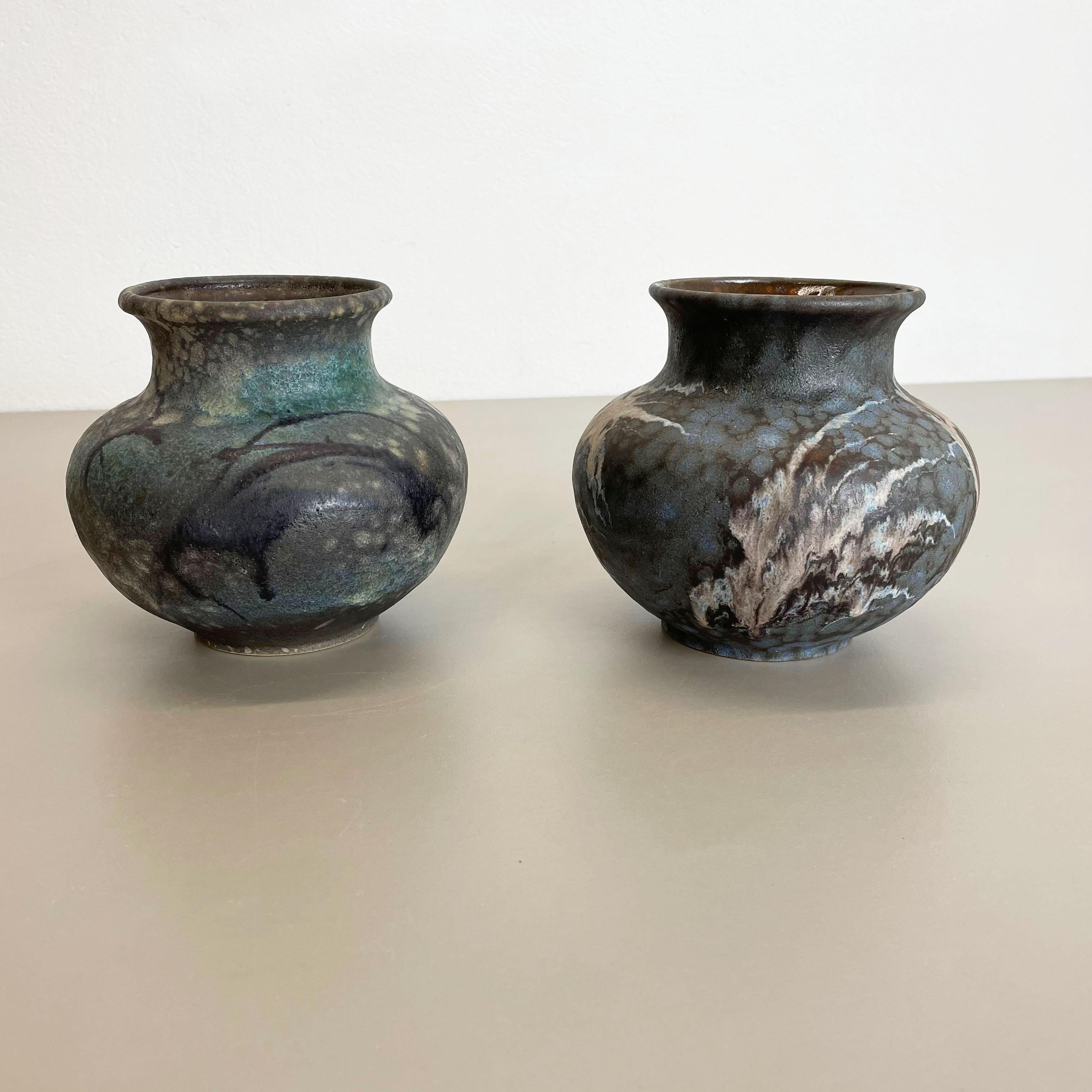 Article:

Set of 2 vases


Producer:

Ruscha, Germany



Decade:

1960s


Description:

This original vintage vase set was designed and produced in the 1960s by Ruscha in Germany. This offer contains a set of two multicolor vases