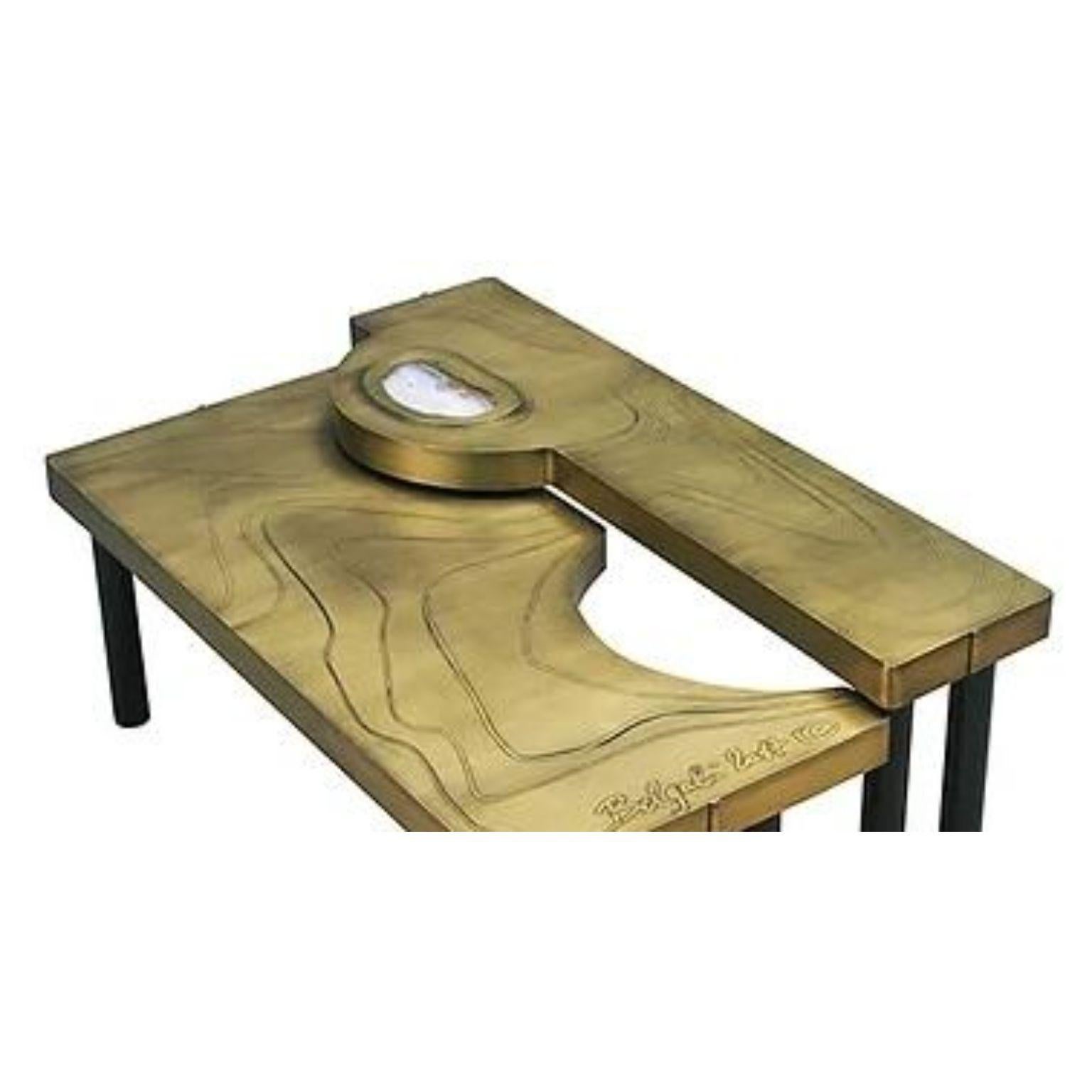 Set Of 2 Puzzle Brass Coffee Tables by Brutalist Be
One Of A Kind
Dimensions: Table 1: D 43 x W 100 x H 31 cm.
Table 2: D 36 x W 100 x H 26 cm.
Materials: Brass and agate stone.

Also available in copper and in matte, glossy or black-patinated