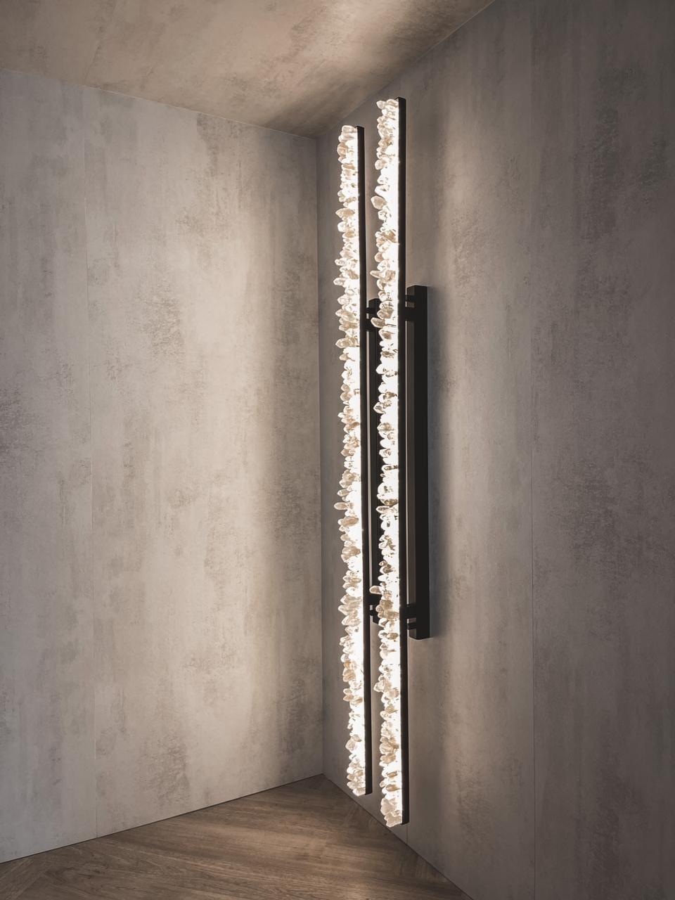 Set of 2 Quartz Wall Light 180 by Aver
Dimensions: W 5 x D 10 x H 180 cm
Materials: White Quartz, metal.
Also available in Smoky Quartz and other metals.

Collection of lamps designed by Waldir Junior for Aver. The collection is featured by its
