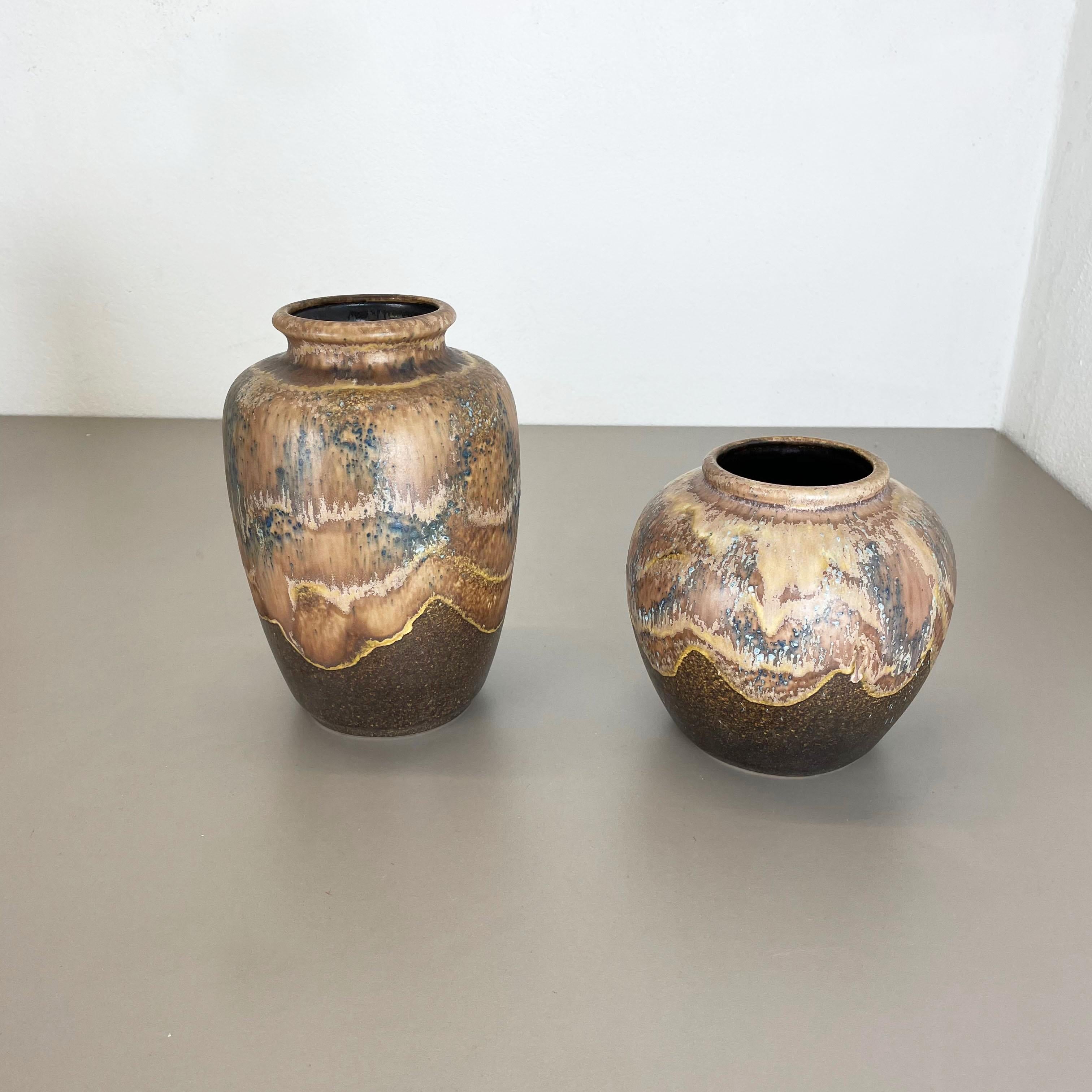 Article:

Pottery ceramic vase set of 2


Producer:

Dümler and Breiden, Germany


Decade:

1960s



Description:

Original vintage 1960s pottery ceramic vases in Germany. High quality German production with a nice abstract