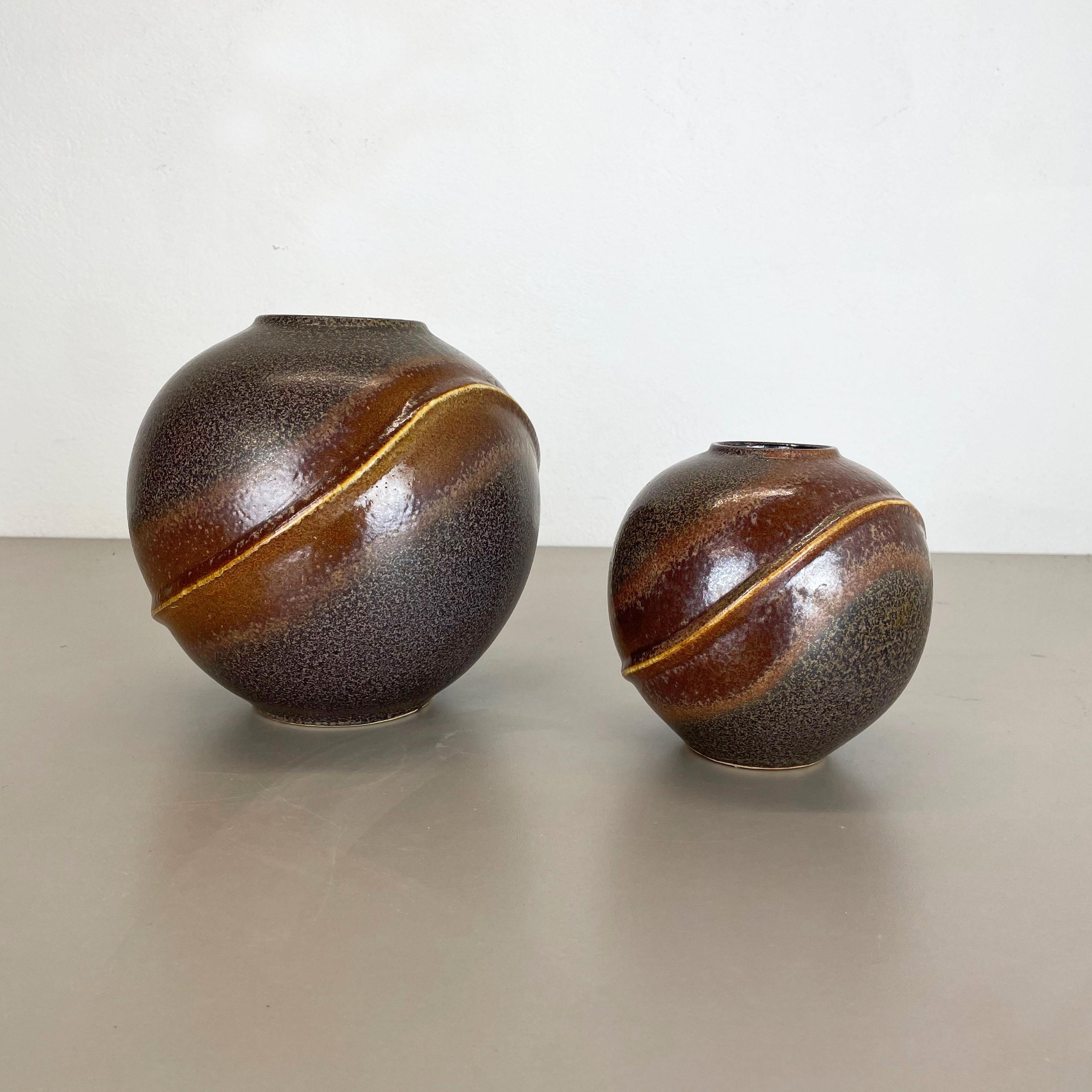 Article:

Pottery ceramic vase set of 2


Producer:

Dümler and Breiden, Germany


Decade:

1970s



Description:

Original vintage 1970s pottery stoneware ceramic vases in Germany. High quality German production with a nice