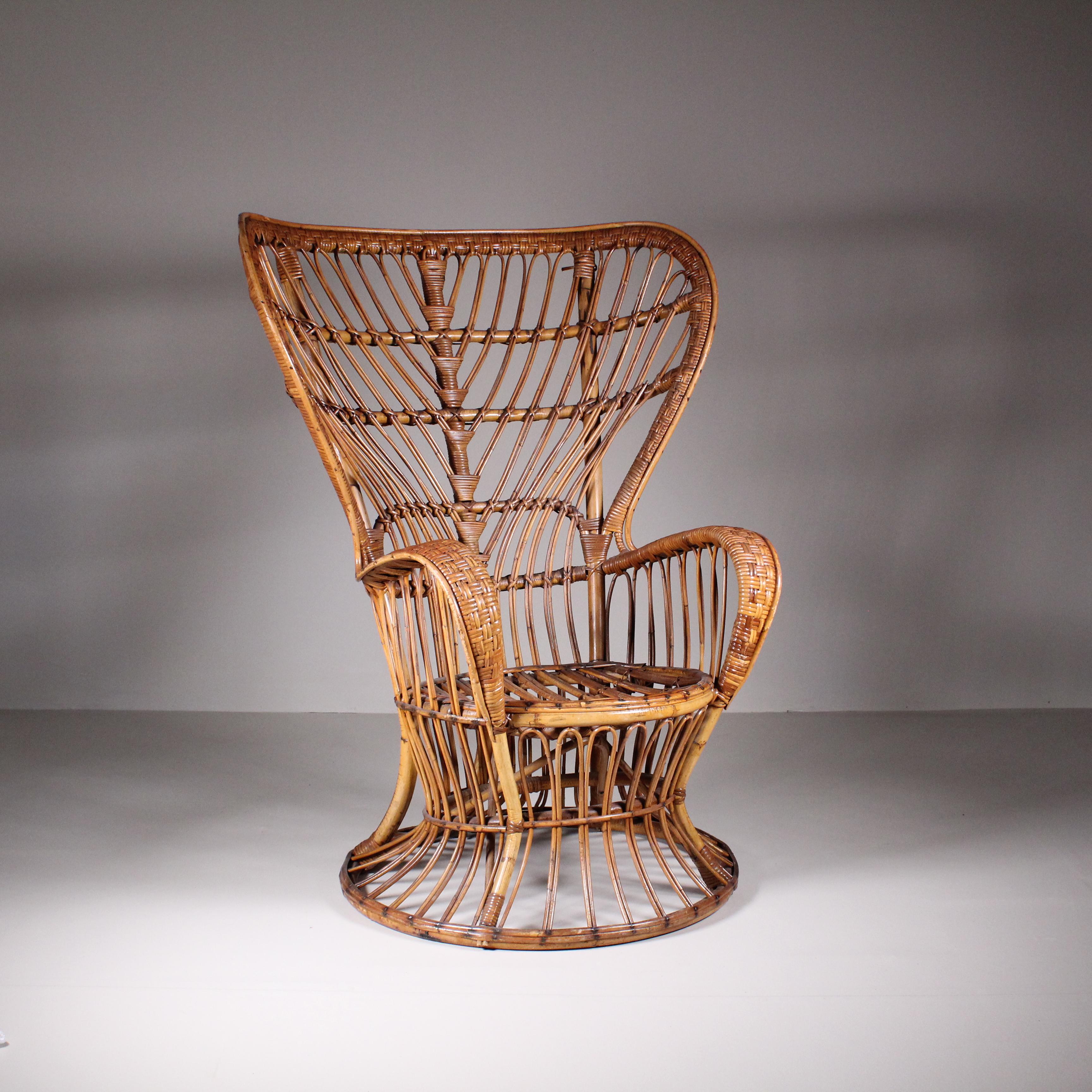 The set of two rattan armchairs by Lio Carminati, circa 1960, stands as a testament to the enduring appeal of mid-century design and the skilled craftsmanship of Italian designer Lio Carminati. Embodying the essence of sophistication and comfort,