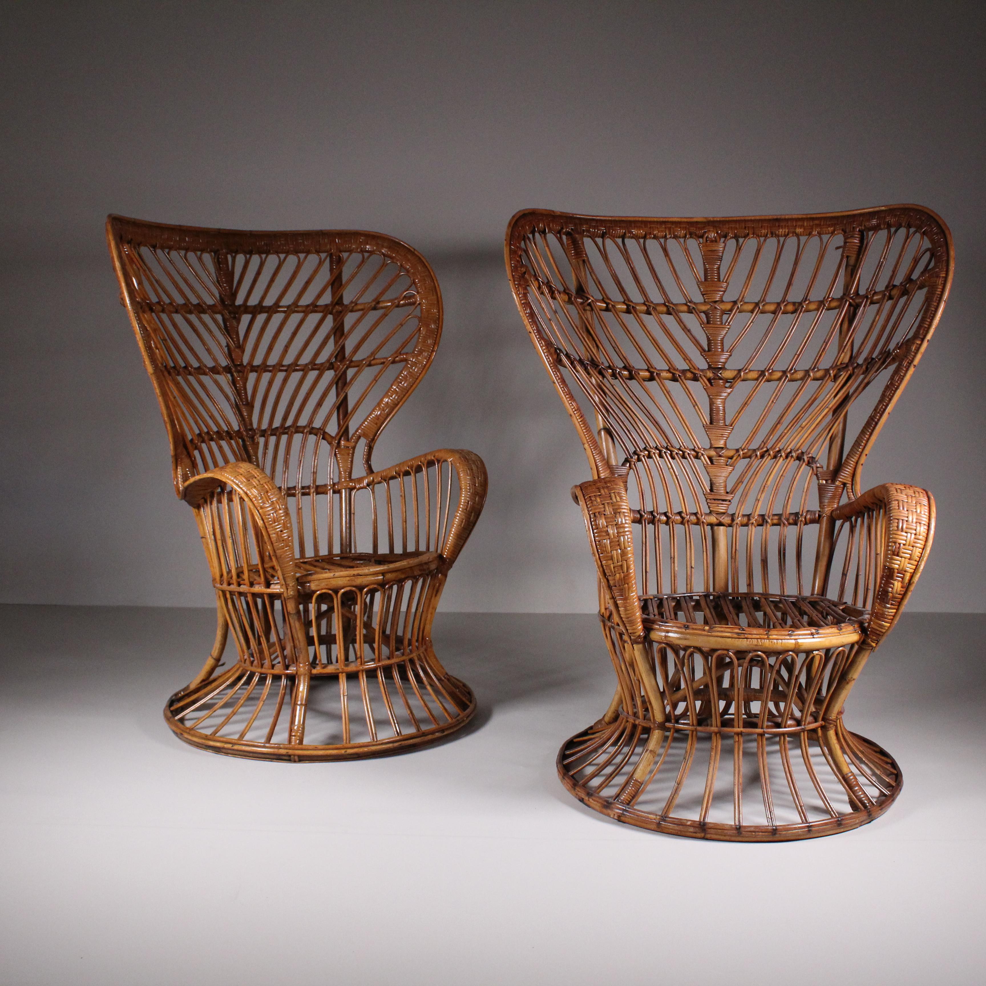 The set of two rattan armchairs by Lio Carminati, circa 1960, stands as a testament to the enduring appeal of mid-century design and the skilled craftsmanship of Italian designer Lio Carminati. Embodying the essence of sophistication and comfort,