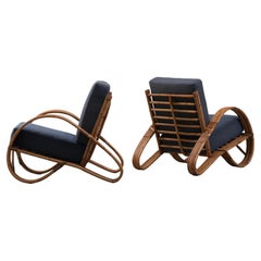 Set of 2 Rattan Lounge Chairs with spiral Cushions in blue fabric, 1970's