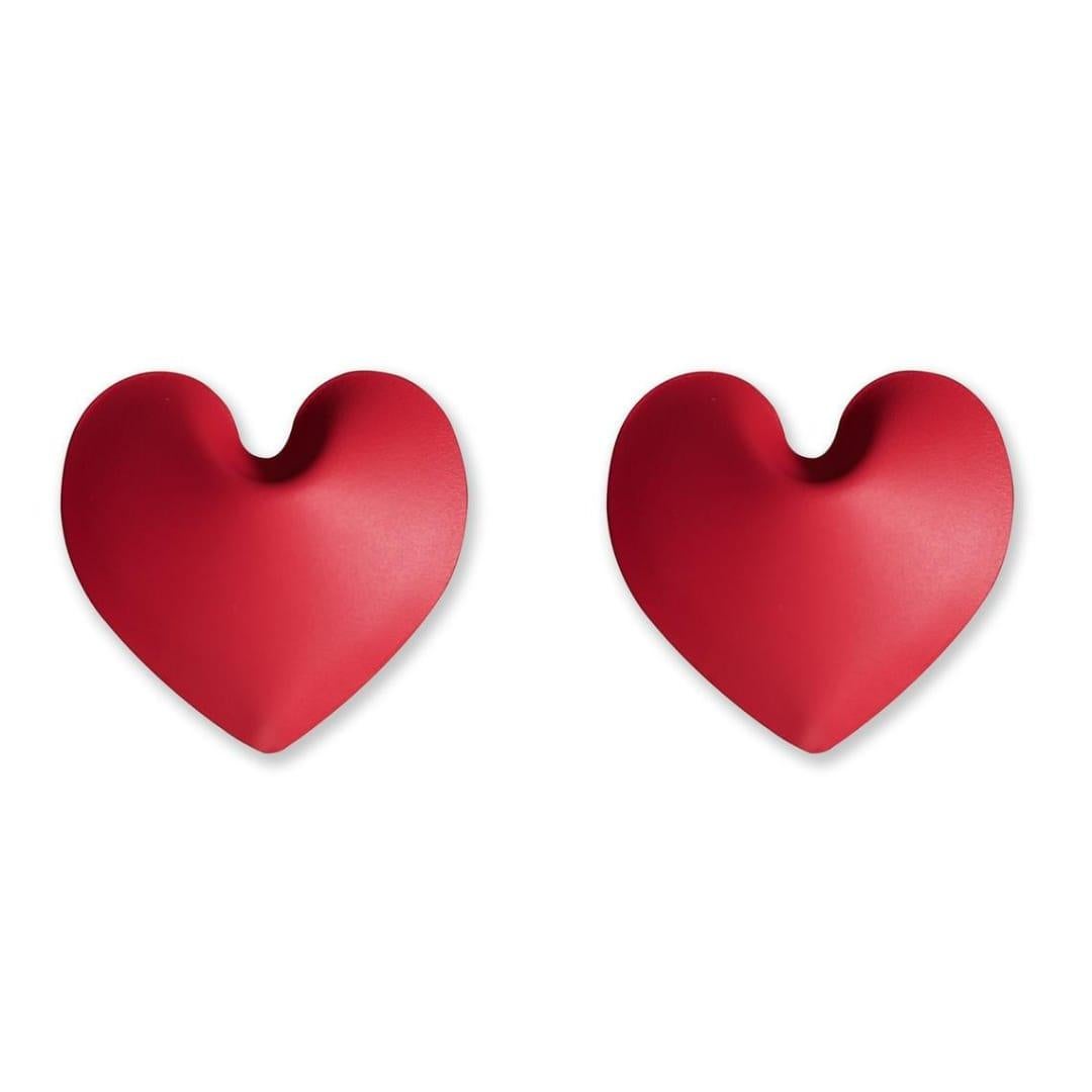 Set of 2 red heart inflated hangers by Zieta
Dimensions: Ø 10 x H 10 cm.
Materials: red carbon steel.

Growing love 
Heart combines art and heat. A tiny DIY object that reveals its magical features when immersed in warmth. It offers a chance to