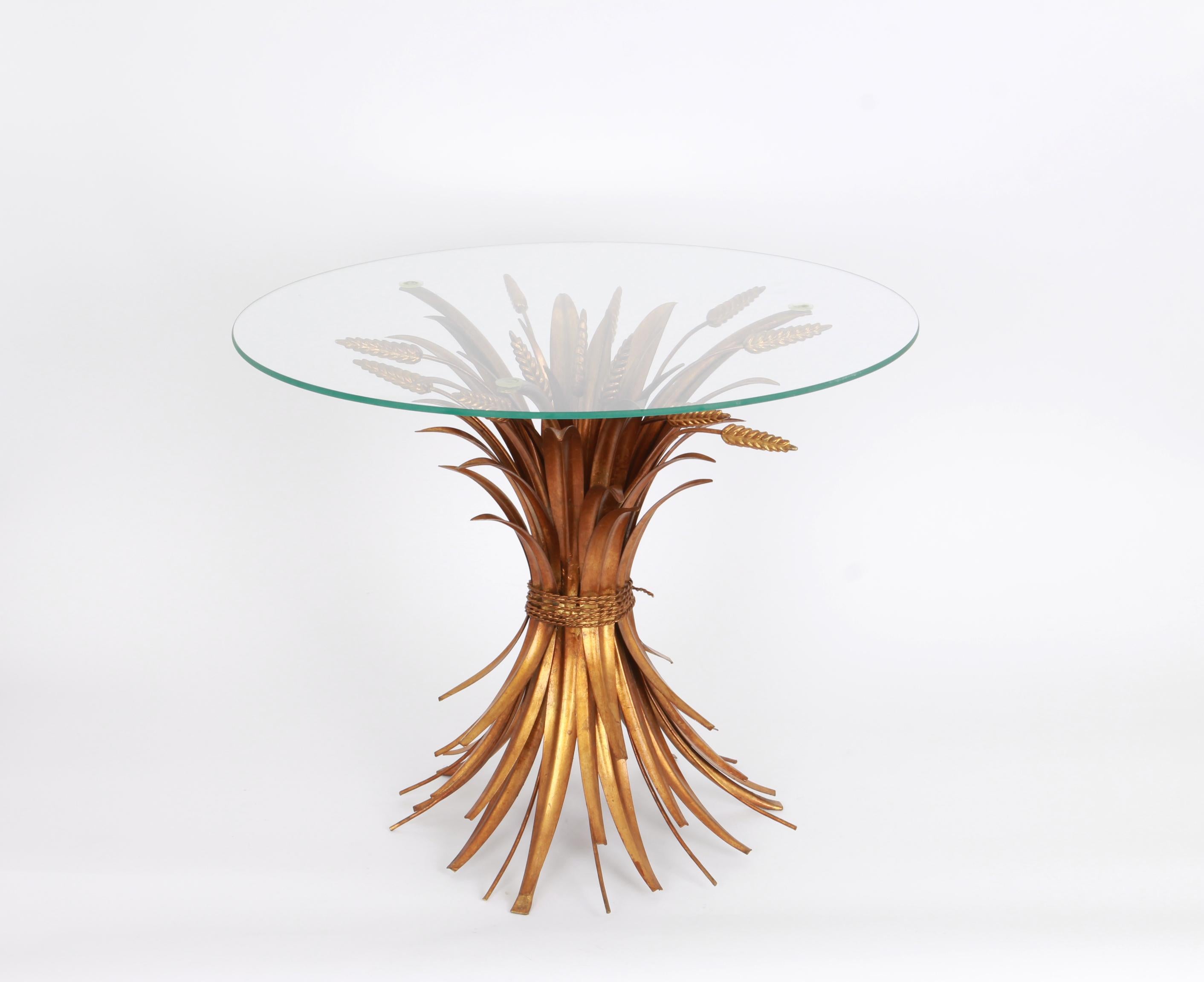 Set of 2 Regency gilt palm tree and wheat coffee table by Hans Kögl, 1970s
Set of 2 side tables produced in Italy in the 1970s for Hans Koegl.
Structure handmade of gold-plated metal in form of palm tree leaves and wheat, circular top made of