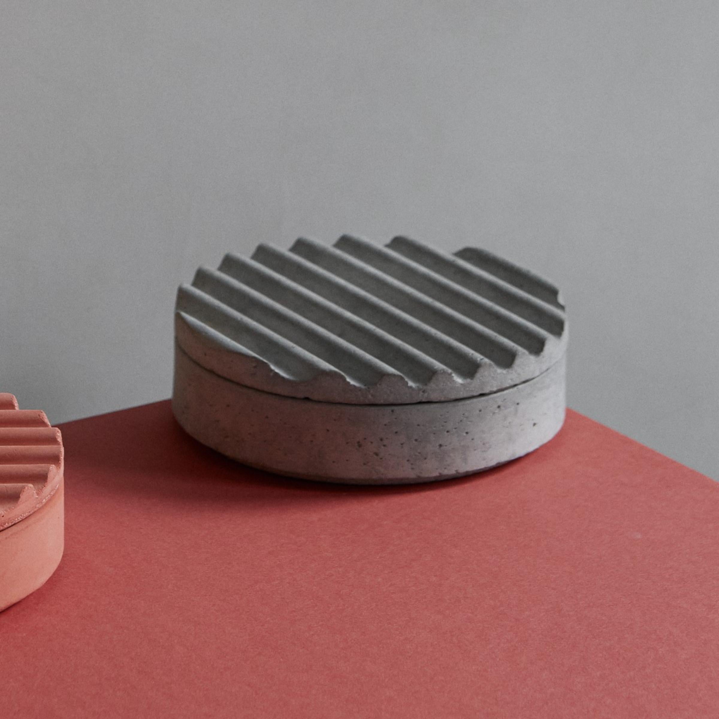 Set of 2 ripple vessels by Derya Arpac
Dimensions: D 17 x H 7 cm
Materials: Pigmented Concrete
Also available: Other colours available.

Derya Arpac is a Copenhagen based architect and furniture designer.
She holds a Master of Arts in
