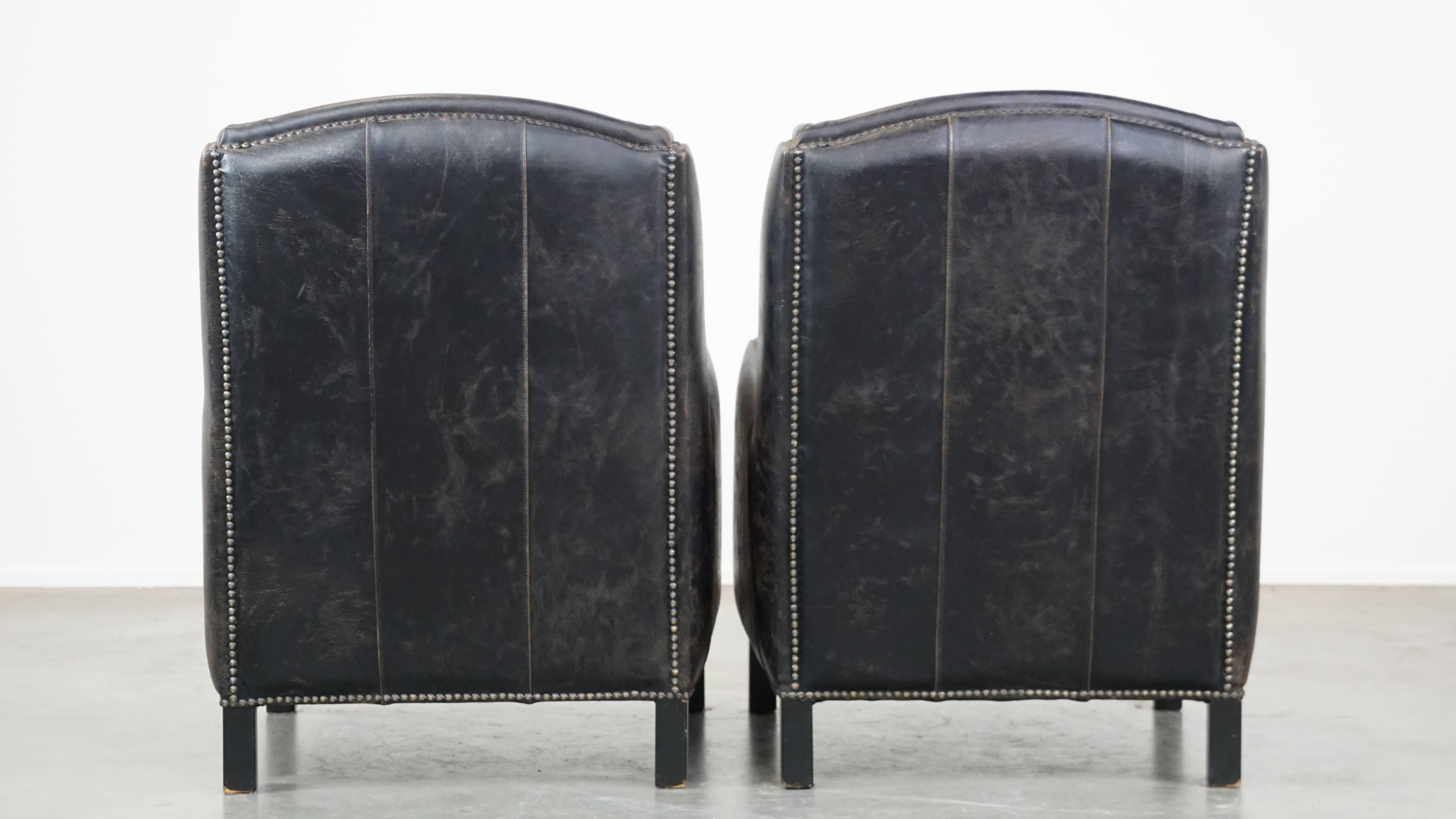 Industrial Set of 2 rugged black cow leather armchairs with high back, industrial style For Sale