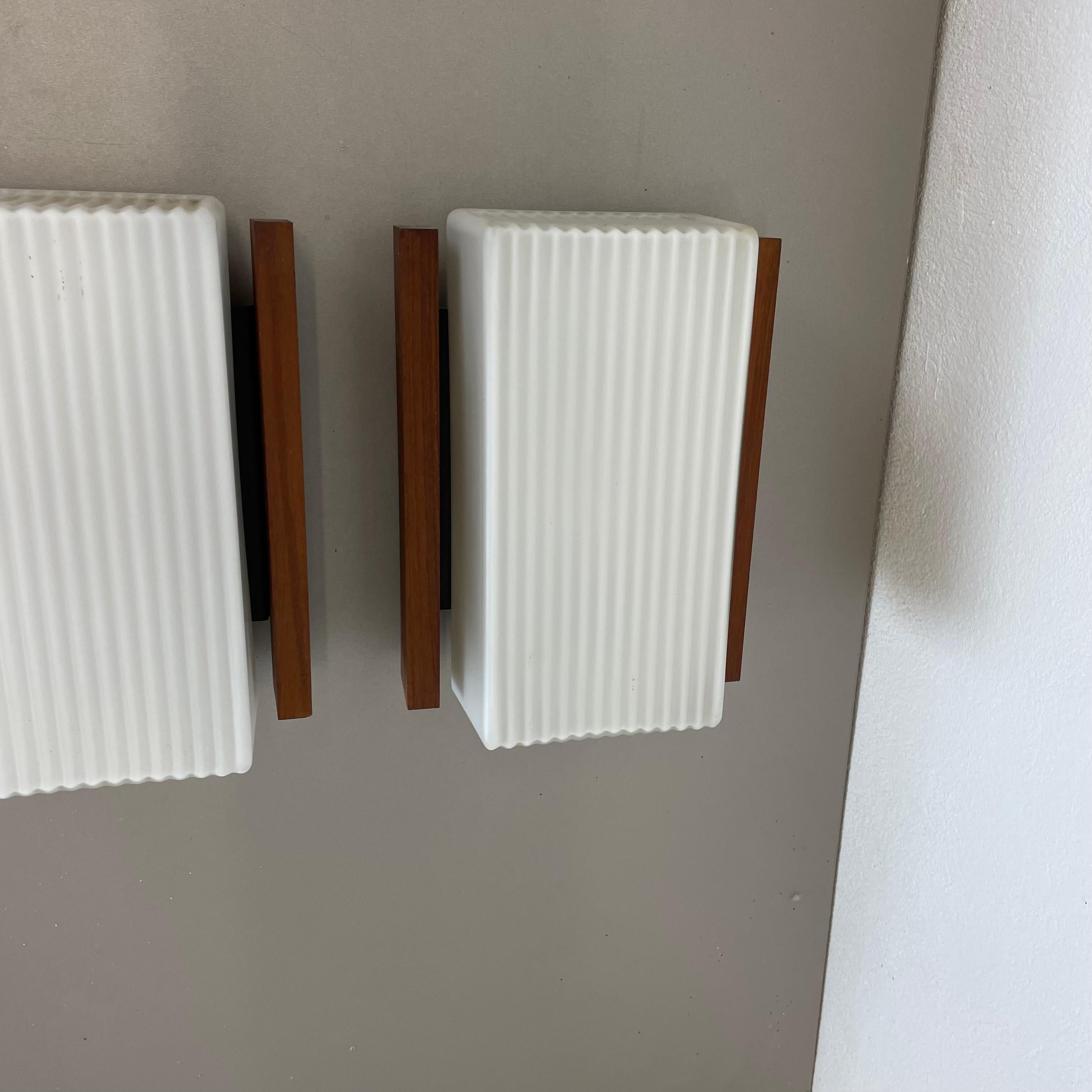 Mid-20th Century Set of 2 satin white glass and teak Wall Lights by BEGA Lights, Germany 1960s For Sale