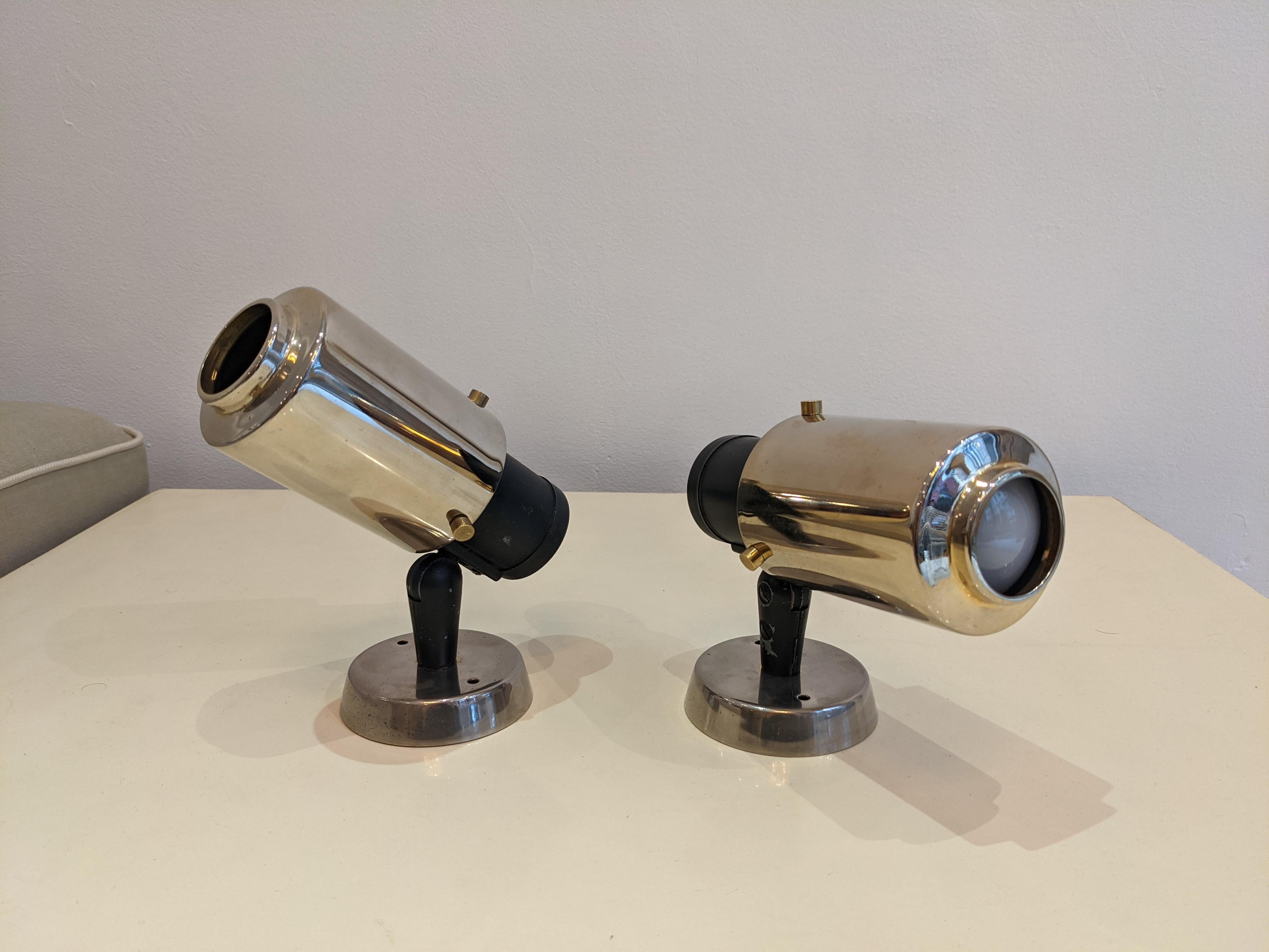 Set of 2 sconces old edition by Jacques Biny. Gold-colored metal and black brass. Very good condition, the lens is missing.
