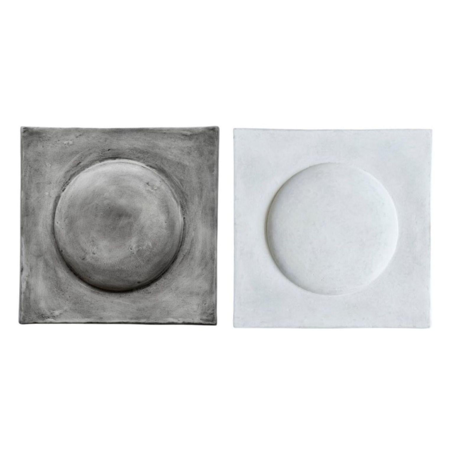 Set of 2 Sculpt Art Shields by 101 Copenhagen
Designed by Kristian Sofus Hansen & Tommy Hyldahl
Dimensions: L58 / W6 / H58 CM
Materials: sustainable paper mass

Sculp wall art questions the idea of traditional wall pictures, in the search for a