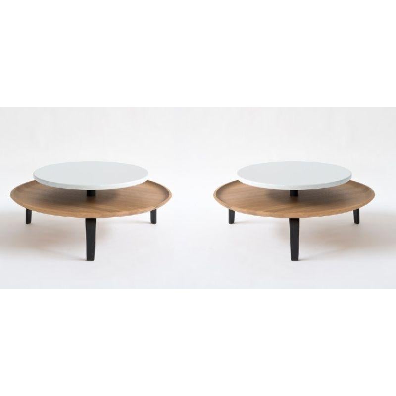 Set of 2, Secreto 85 coffee tables, white, “Nuit de Noel” by Colé Italia
Dimensions: H.32; base plate ø 85, top ø 60 cm
Materials: Coach table with 2 rounded plates; 3 legs and base plate in natural solid oak;
top matt lacquered in 5