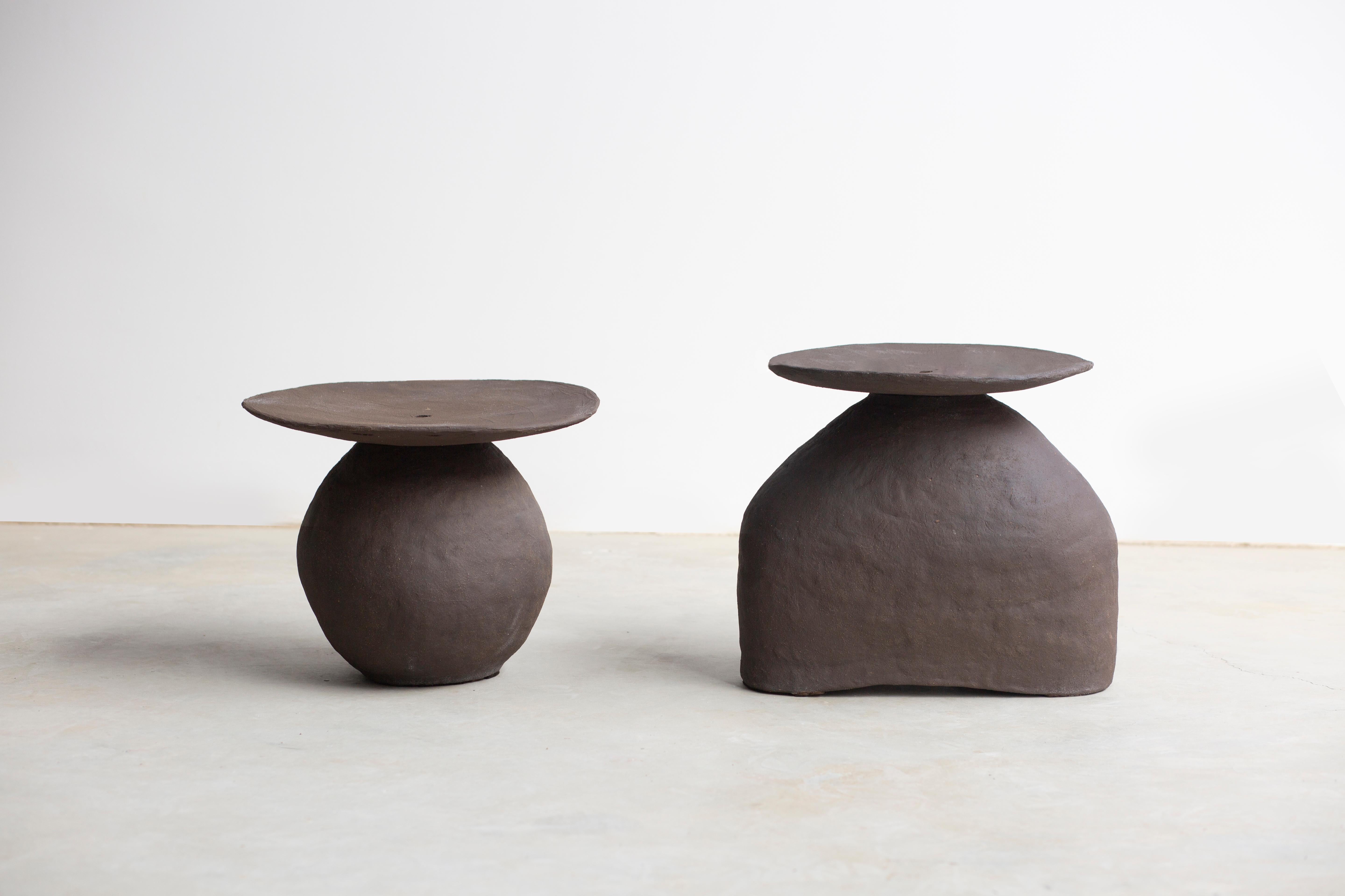 Set Of 2 Senex Low Tables by Isin Sezgi Avci
Unique Pieces.
Dimensions: Table 1: D 36 x W 46 x H 40 cm.
Table 2: D 35 x W 45 x H 32 cm.
Materials: Hand-built ceramic.

The Senex low table is a set of two pieces of ceramic sculptural furniture. Senex