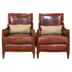 Set of 2 sheep leather Art Deco design armchairs finished with wood