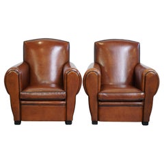 Set di 2 poltrone di design in pelle di pecora modello baffi, in buone condizioni
