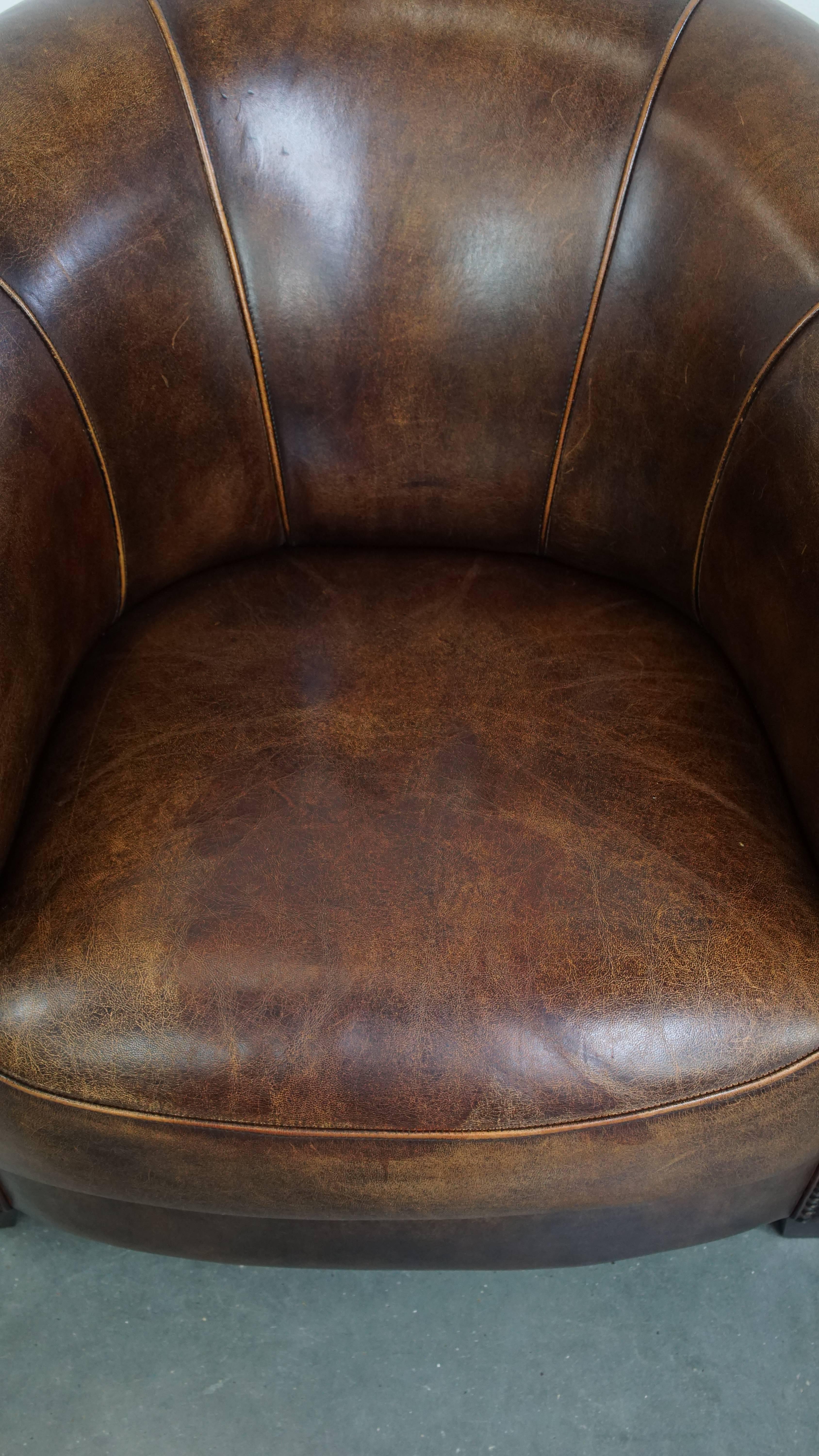 Juego de 2 sillones Club de piel de oveja en Bastante bueno estado para la venta en Harderwijk, NL
