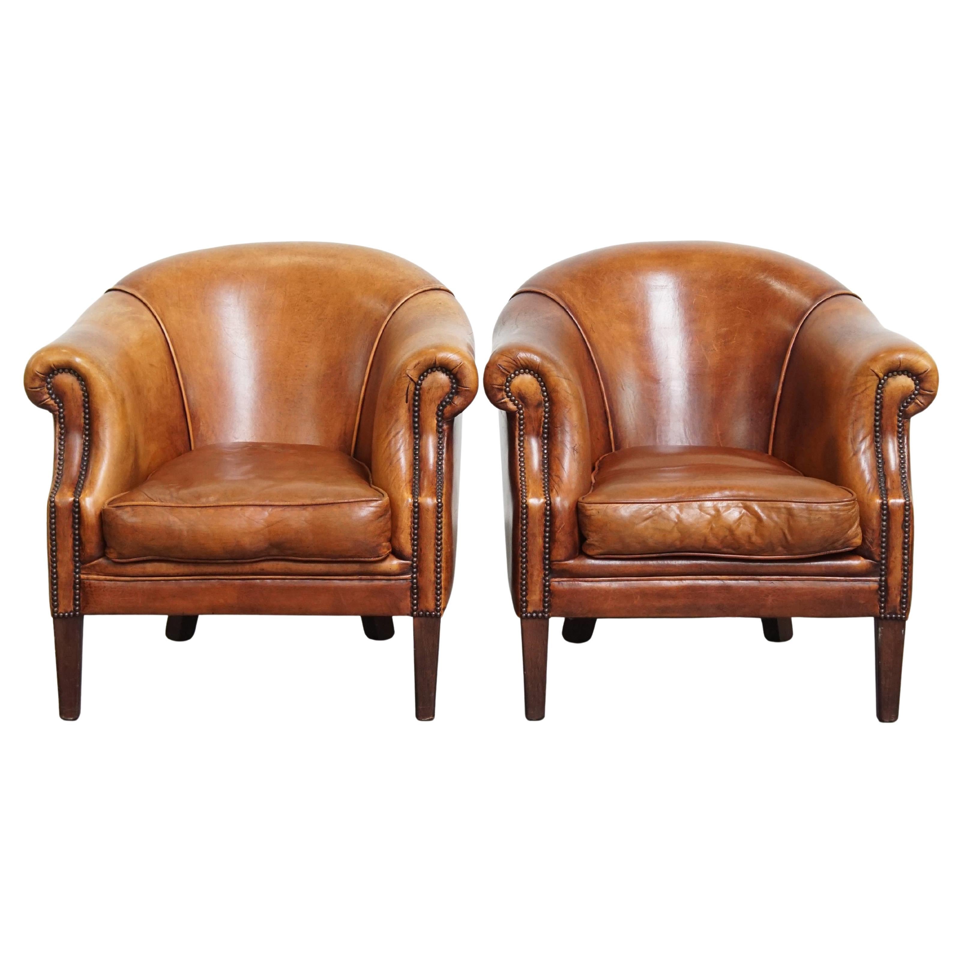 Ensemble de 2 fauteuils club en cuir de mouton