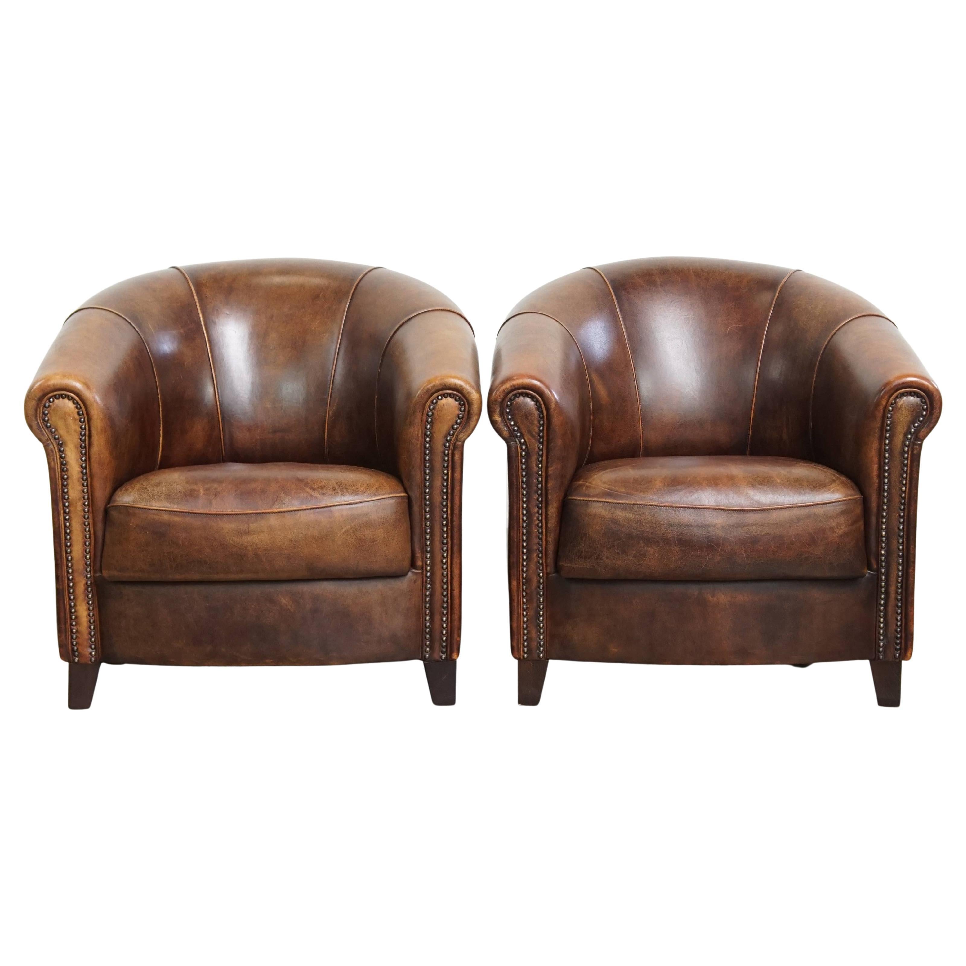 Juego de 2 sillones Club de piel de oveja en venta