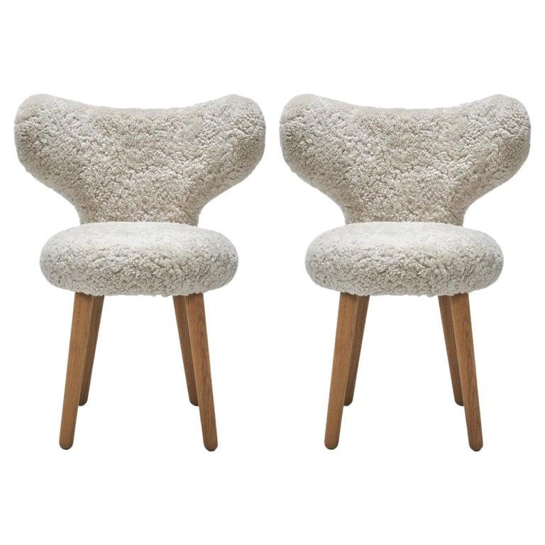Set Of 2 sheepskin WNG chairs by Mazo Design
Dimensions: W 60 x D 50 x H 76 cm
Materials: oak, sheepskin. 
Also available: DAW/Royal, KVADRAT/Hallingdal & Fiord, BUTE/Storr, KVADRAT/ Vidar, DAW/Mcnutt, DEDAR/Artemidor.

The WNG Chair’s rounded