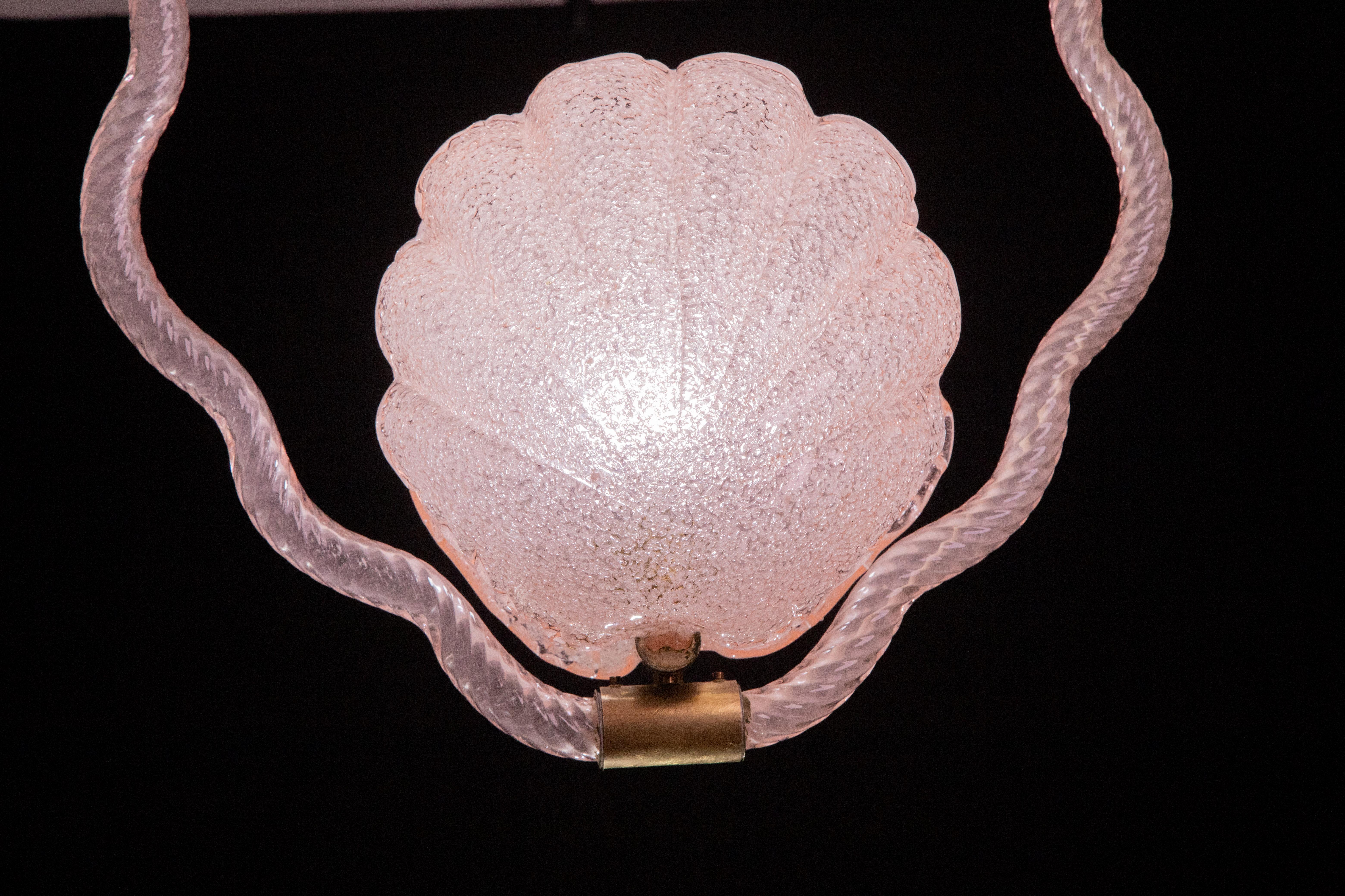 Unique pair of Murano chandeliers, Barovier and Toso glassworks, one pink and one transparent shell-shaped.

1940s-50s.

The chandeliers are very similar but not identical.

Pink:

Stunning Murano chandelier by artist Barovier and Toso with rare