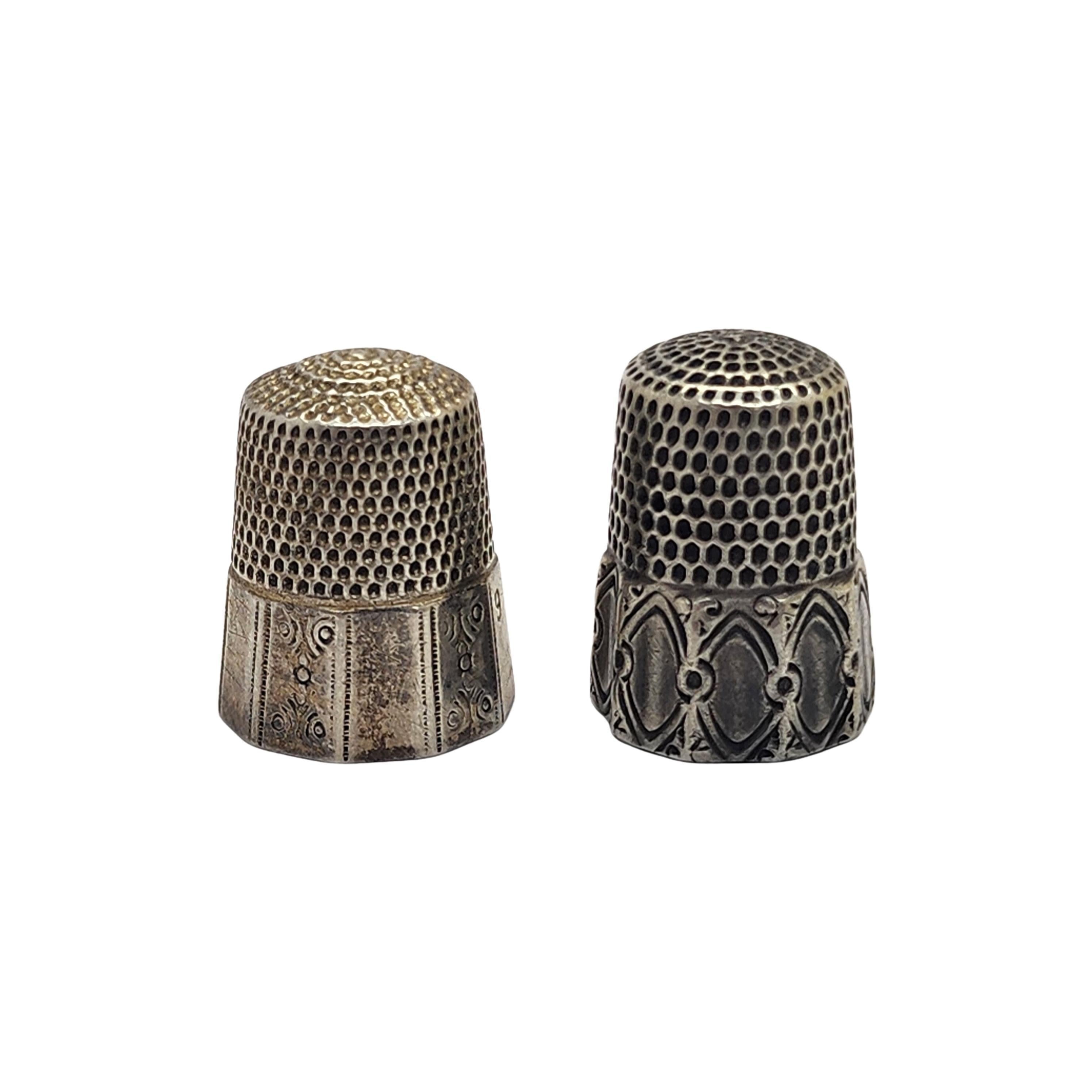 Set of 2 sterling silver thimble by Simon Bros Sizes 8 and 9.

Both thimbles feature etched fluted panels.
 
Both thimbles measure approx 3/4