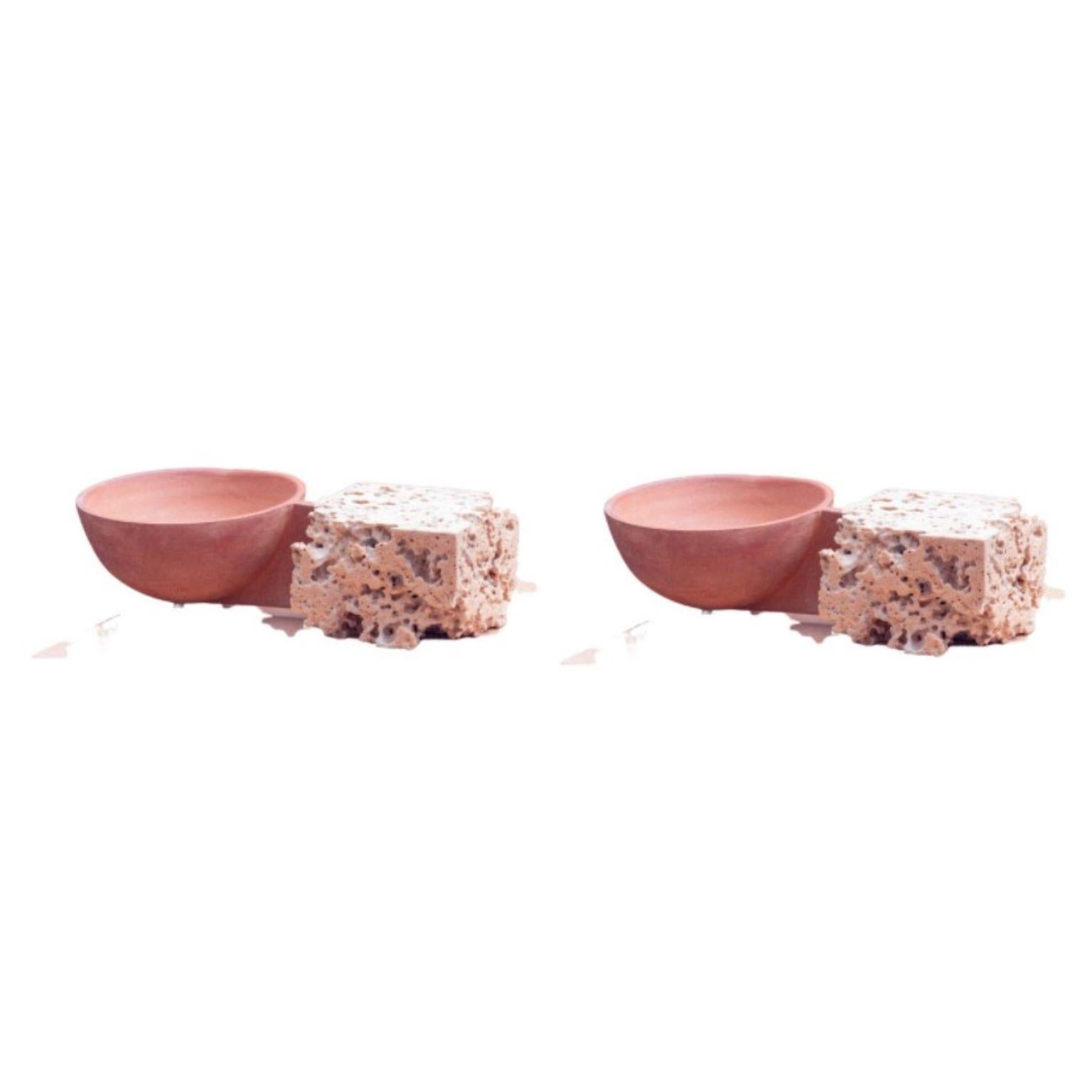 Set of 2 Single Bowls by Turbina
Dimensions: D 4.5 x W15.5 x H8 cm each
Materials: CLAY, STONE CAST

The pieces are inspired by traditional pottery and made up intersecting earth and stone through fired clay and stone cast. The concept starts