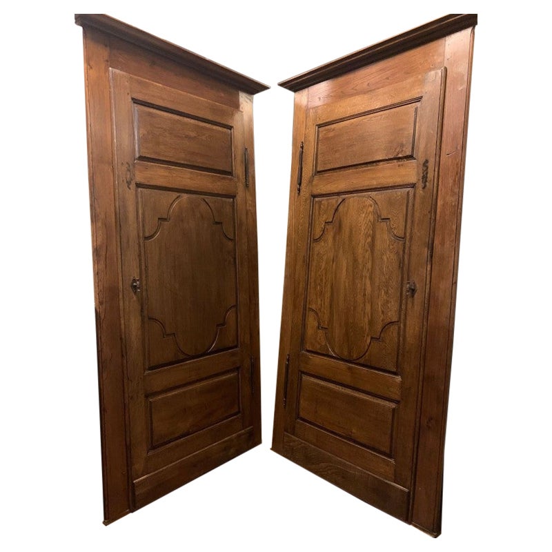 set of 2 single-leaf oak doors carved with frame, Italy