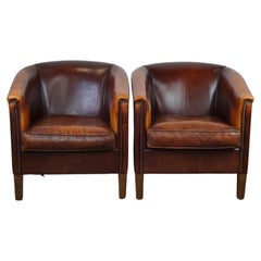 Set of 2 sleek, subtle sheep leather design club chairs with great colors