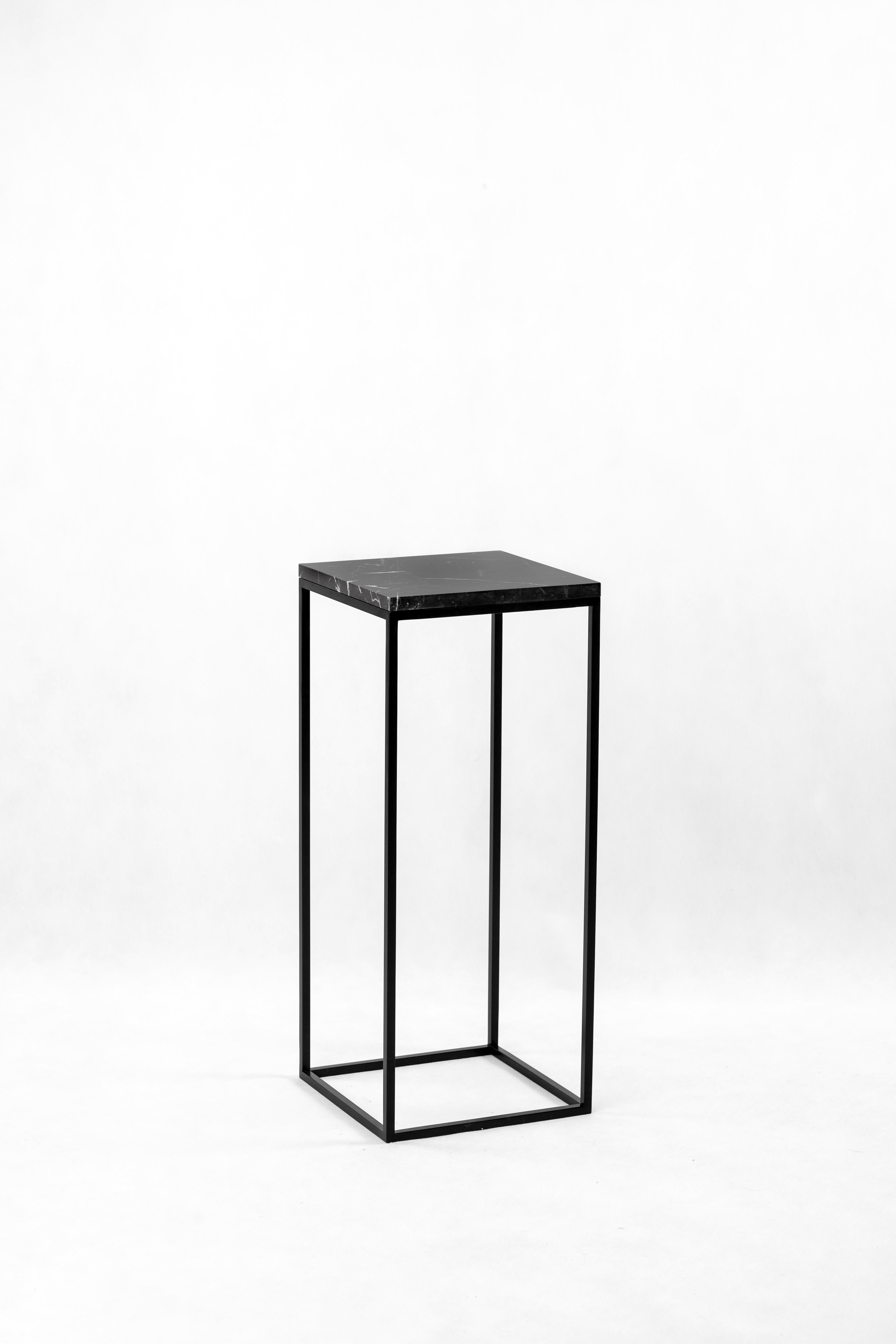 Set of 2 small and medium Pillar side tables by Un’common
Dimensions: W 30 x D 30 x H 72 cm / W 30 x D 30 x H 42 cm.
Materials: Nero Marquina marble, steel.
Available in 3 sizes: H42, H72, H90 cm.

PILLAR is a piece of accessory furniture. Do