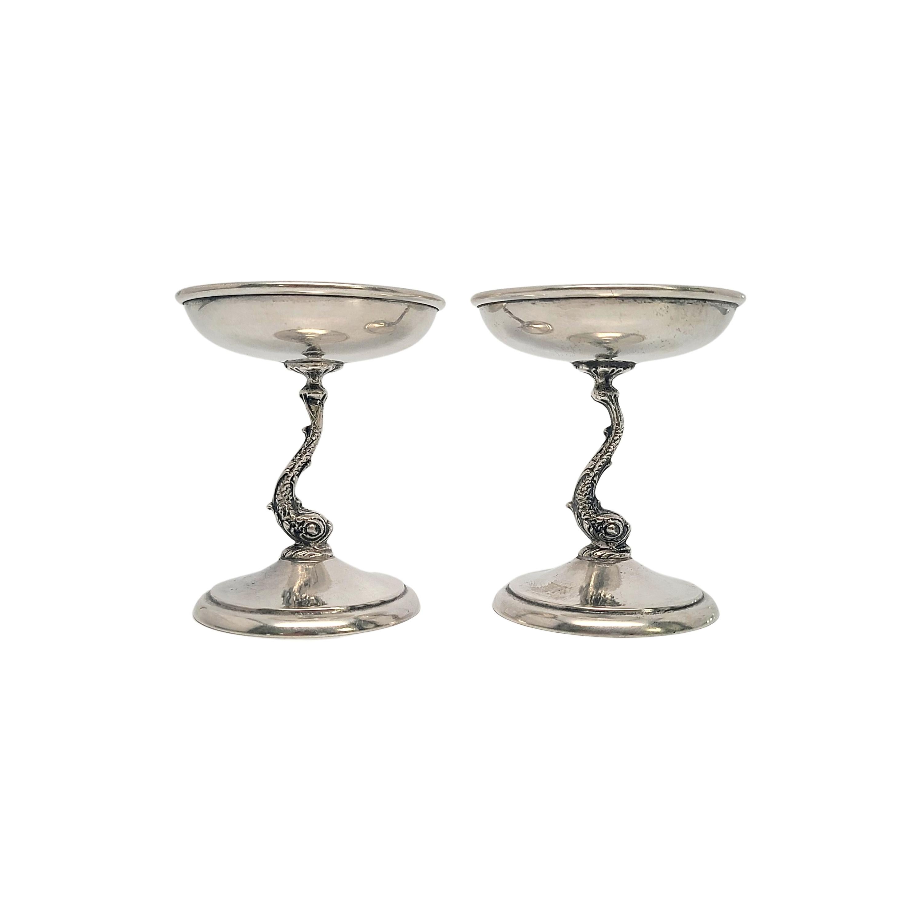 Set of 2 sterling silver fish stem bowls.

Small footed bowls with figural fish stems. Can also be used to hold small votive candles.

Measures approx 3 1/8