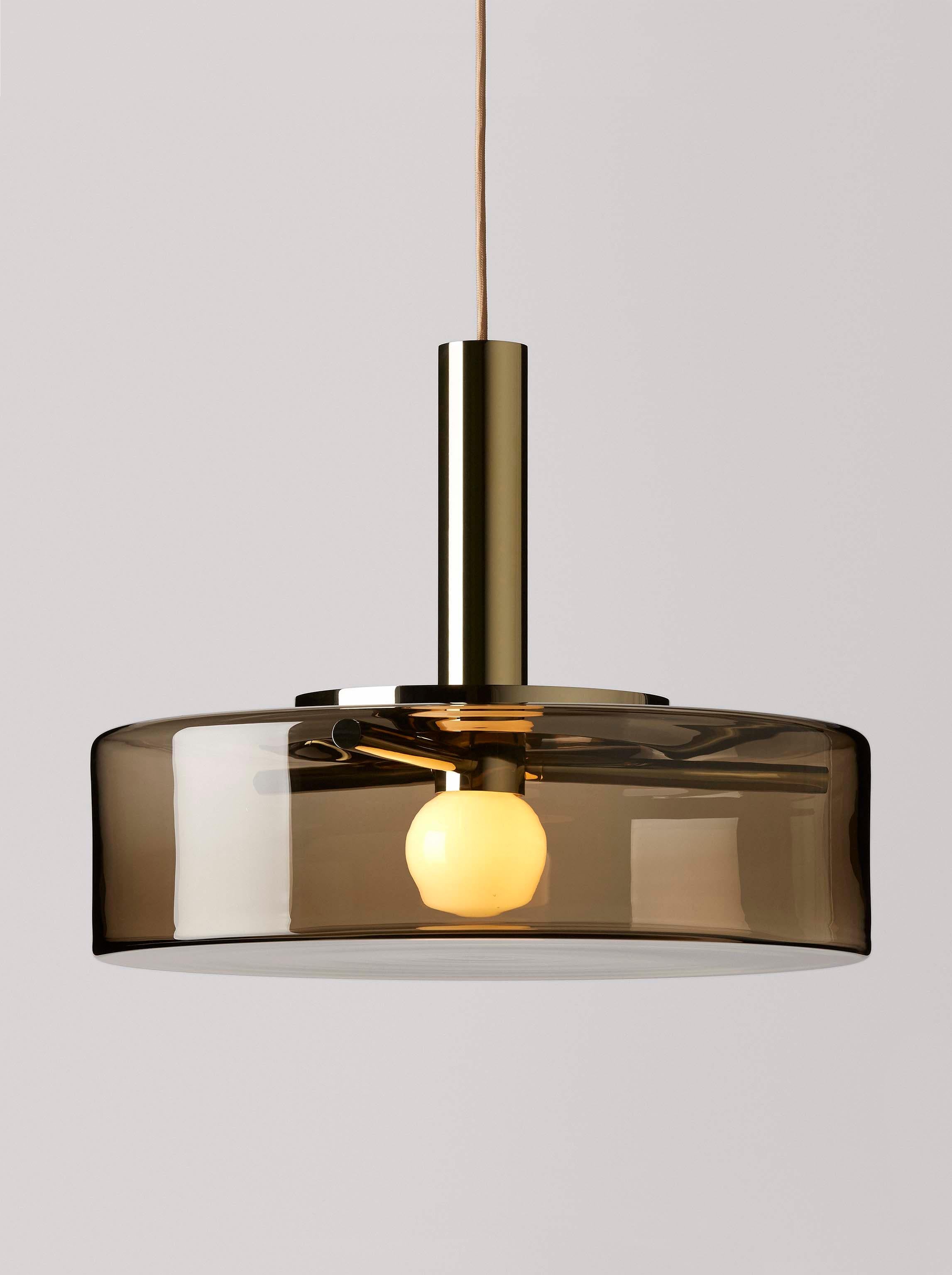 Set of 2 smoke grey pendant light by Dechem Studio
Dimensions: D 56 x H 180 cm
Materials: brass, glass.
Also available: different colours and sizes available

Named after the series of successful Czechoslovak science satellites that orbited the