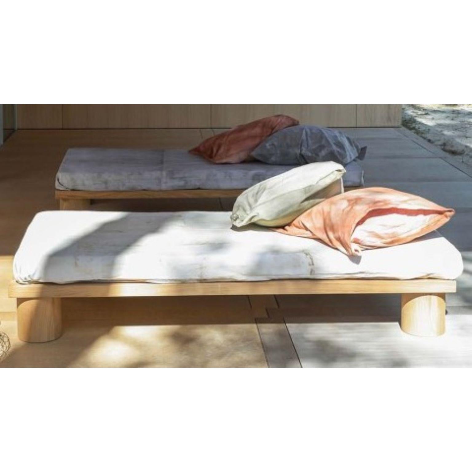 Set Of 2 Solid Oak Small Beds by Mylene Niedzialkowski
Dimensions: L 90 x W 200.
Materials: Solid oak wood.

A solid oak bed with turned legs, available in several sizes and made entirely handmade in the South West. Made from solid oak from French