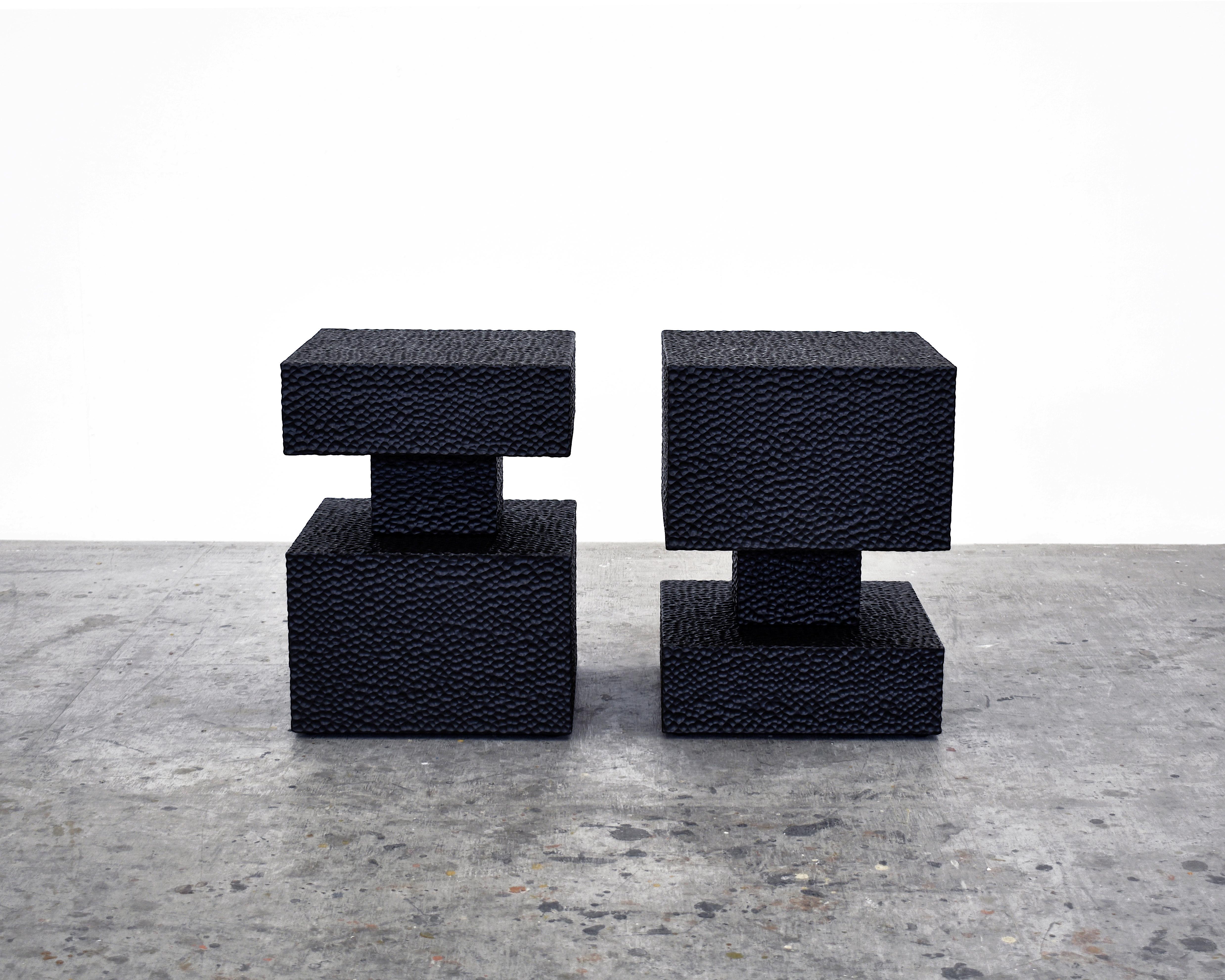 Set of 2 square revert table by John Eric Byers
Dimensions: 50.8 x diameter 40.6 cm
Materials: Carved blackened maple

All works are individually handmade to order.

John Eric Byers creates geometrically inspired pieces that are minimal,