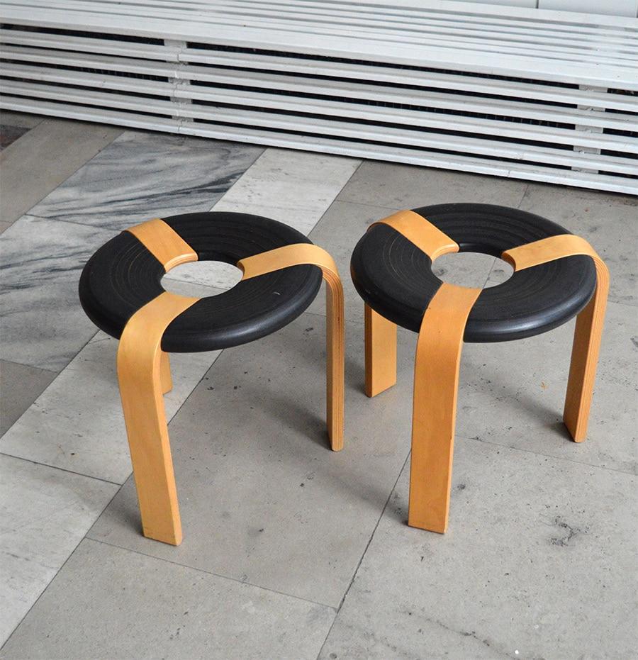 Set of 2 rare Scandinavian stackable stools designed by Rud Thygesen and Johnny Sørensen for Magnus Olesen in the 1970s, Denmark.

These unique donut-shaped stools are made from oak wood and each features a black painted oak circular seat with 3