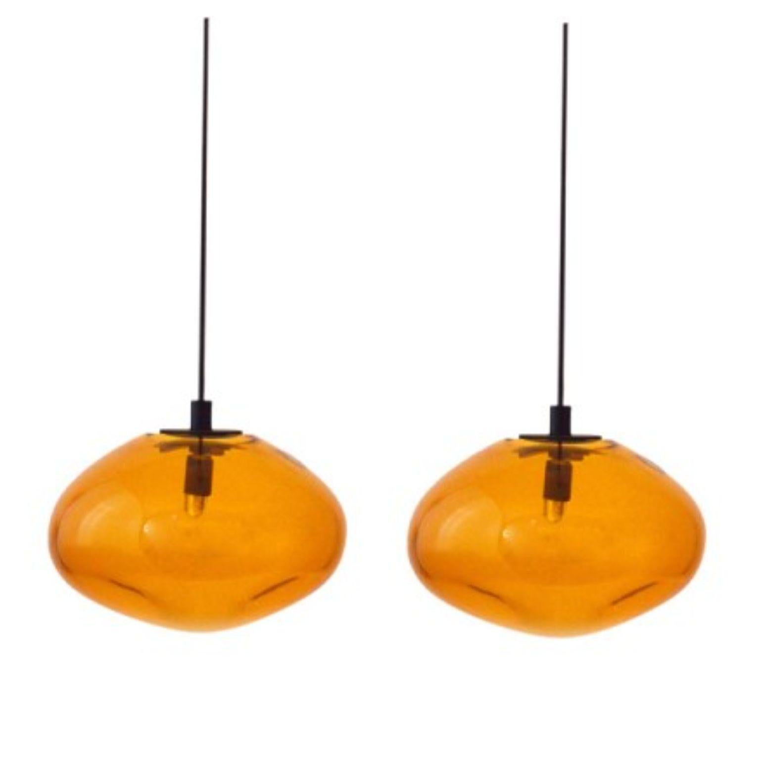 Set of 2 starglow gold pendants by Eloa
Material: glass, steel, silver
Dimensions: D15 x W13 x H100 cm
Also Available in different colours and dimensions.

All our lamps can be wired according to each country. If sold to the USA it will be