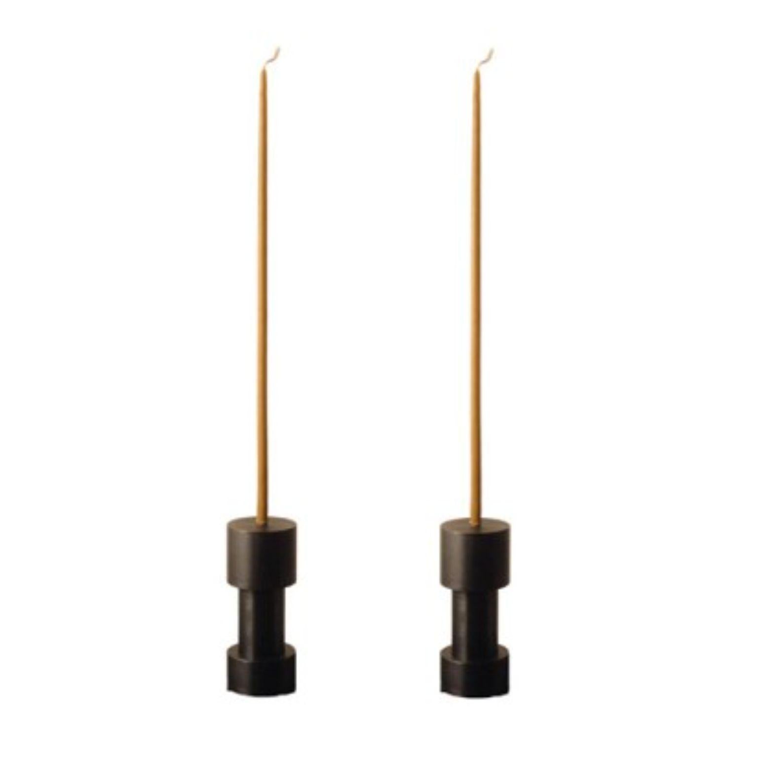 Set of 2 steel another candleholders by Radu Abraham
Materials: steel
Dimensions: D8 x H14cm

3 Piece candle holder; can be used with multiple types of candles or with standard candle pill; if detached from each other, each element can be used